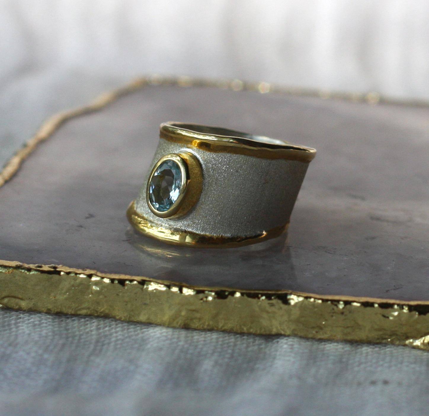 Oval Cut Yianni Creations Aquamarine Fine Silver and 24 Karat Gold Asymmetric Band Ring For Sale