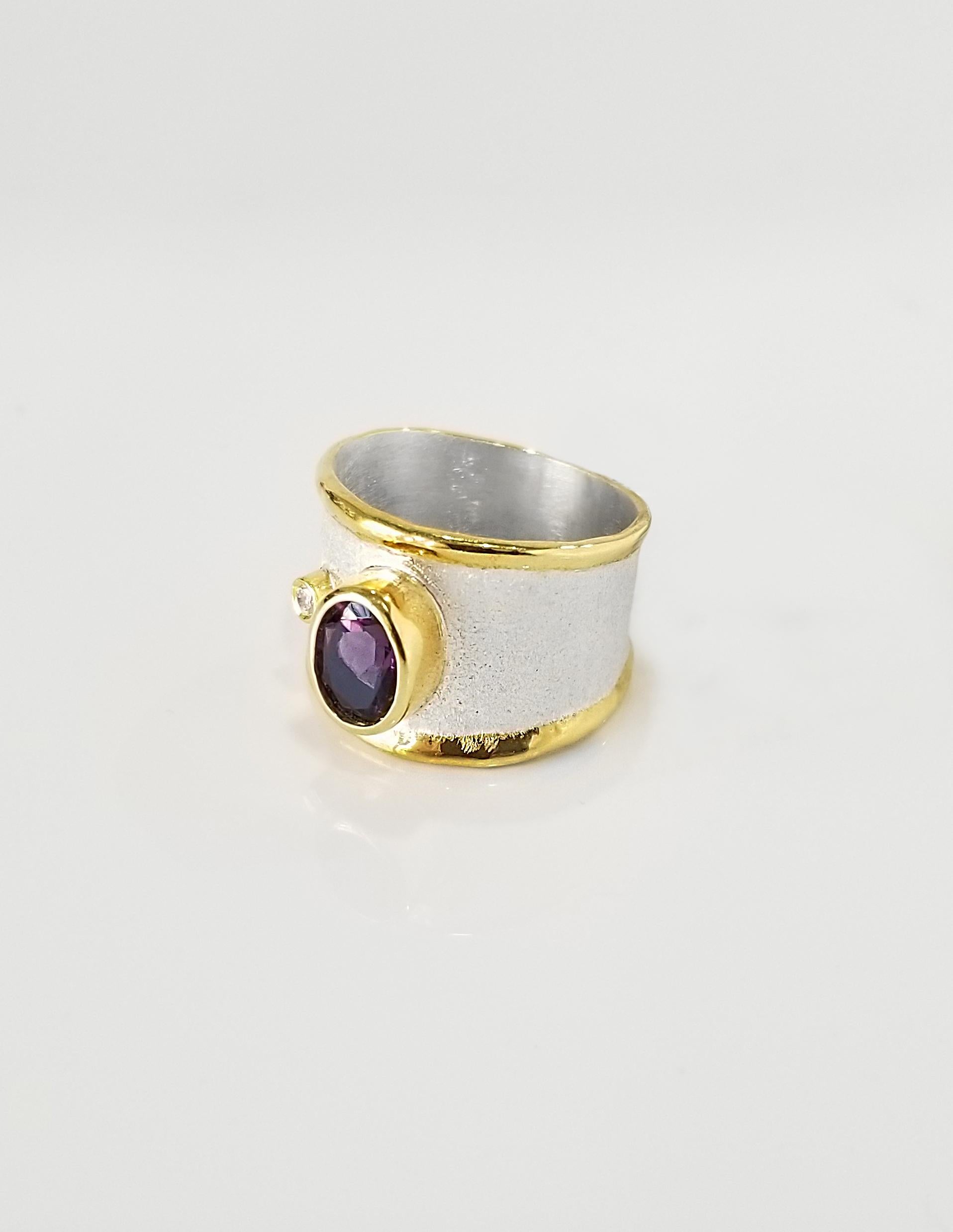 Yianni Creations Midas Collection 100% Handmade Artisan Ring from Fine Silver with an overlay of 24 Karat Yellow Gold. This gorgeous ring an Amethyst total weight of 1.25 Carat accompanied by a 0.03 Carat Diamond complemented by a unique technique