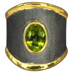 Yianni Creations Fine Silver and Gold Two-Tone Peridot Thick Band Rhodium Ring