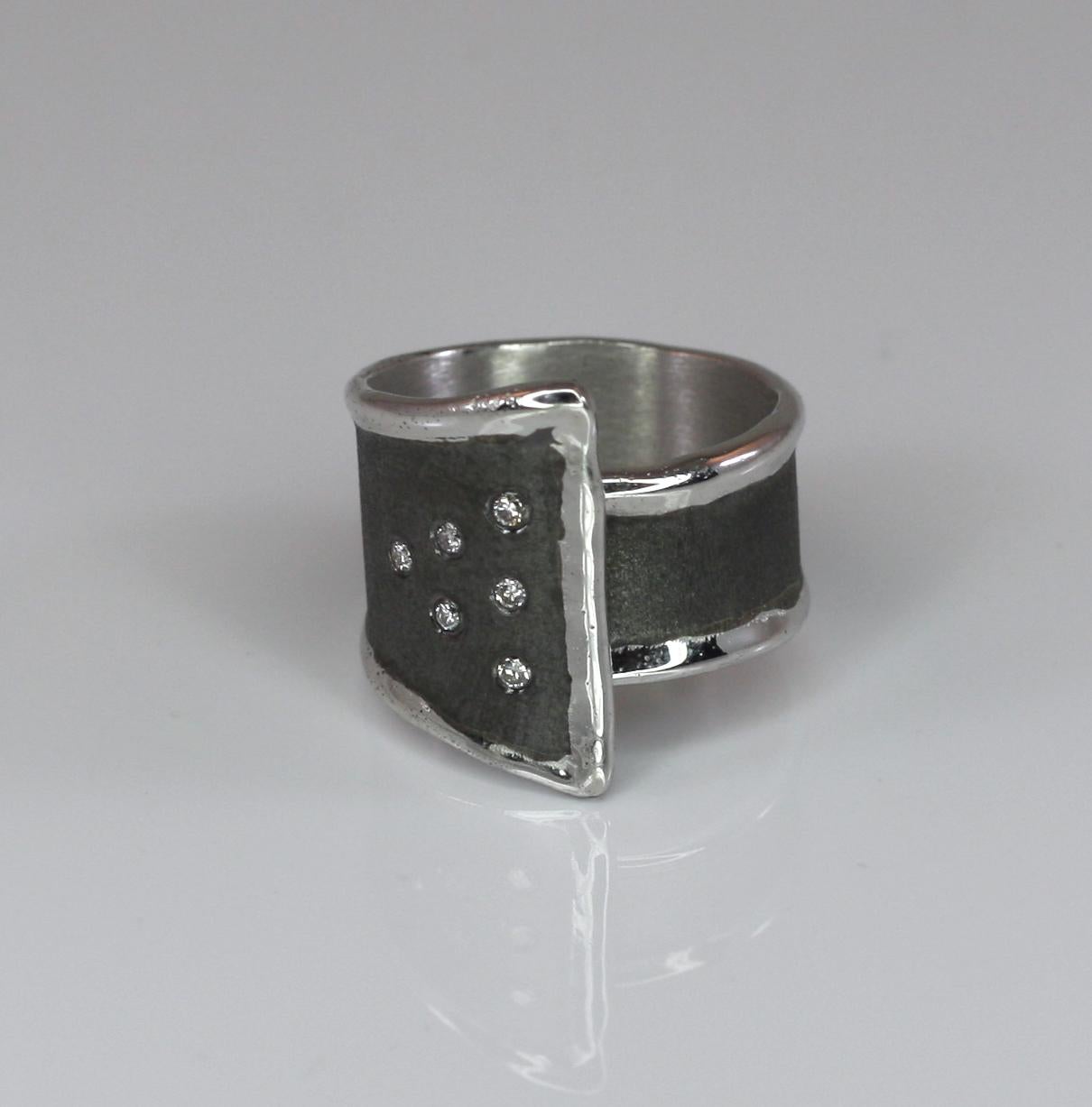 Yianni Creations 100% Handmade Artisan Ring from Fine Silver and plated with Palladium, to resist elements. This gorgeous ring features 6 brilliant-cut, a total weight of 0.18 Carat. The brushed texture has a Black Rhodium finish in contrast with