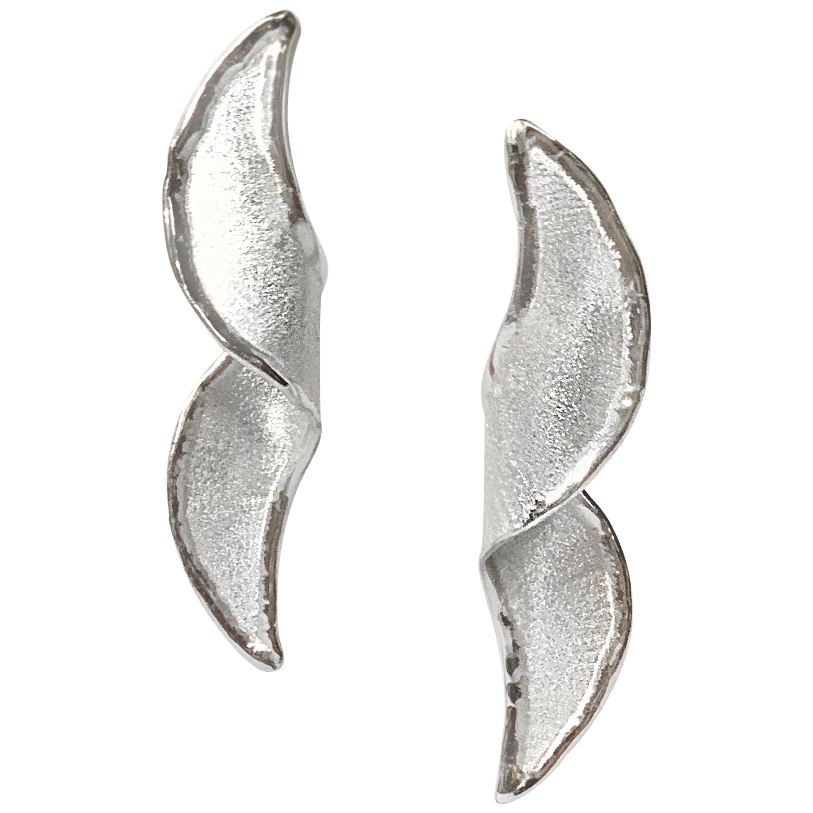 Yianni Creations Ammos Collection 100% Handmade Artisan Earrings from Fine Silver. These eye-catching earrings present unique techniques of craftsmanship - brushed texture and nature-inspired liquid edges together with an unusual shape. The core of