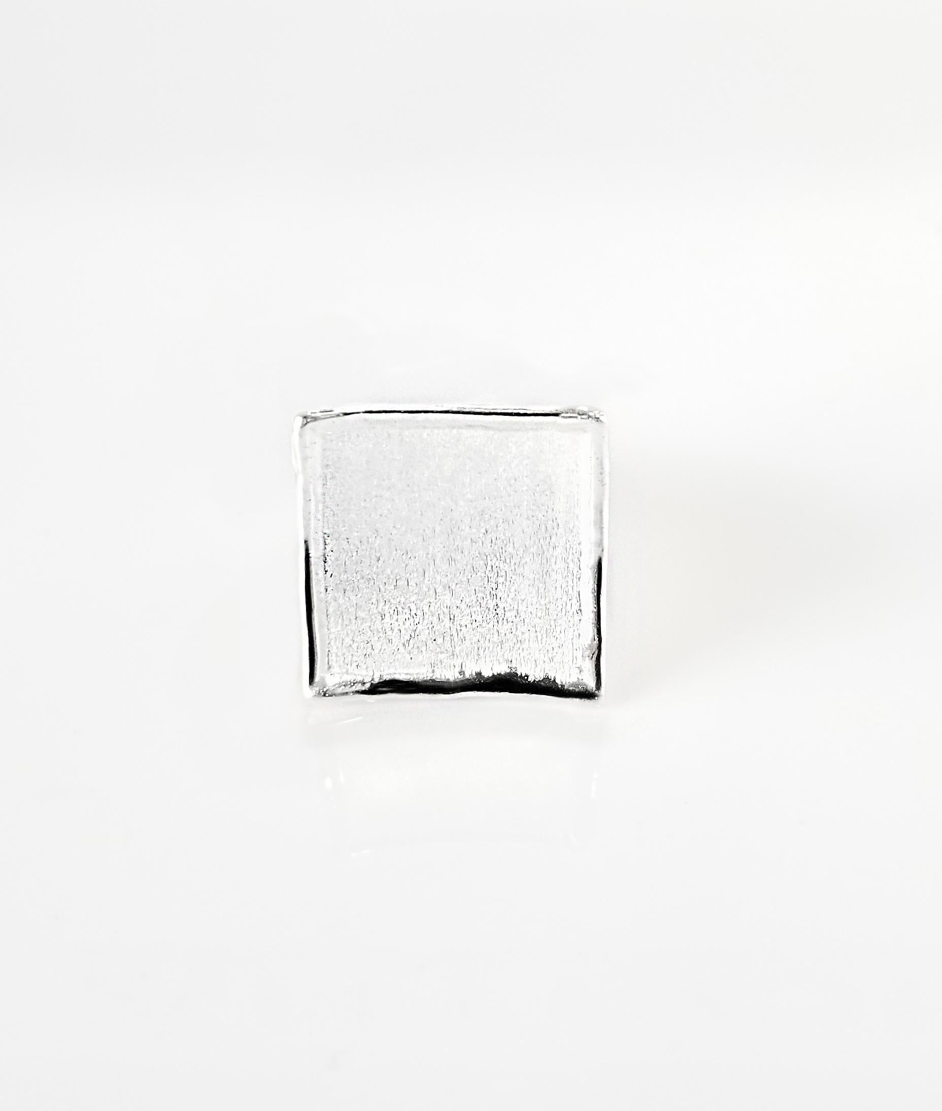 Yianni Creations Ammos Collection 100% handmade artisan ring from fine silver 950 purity plated with palladium to resist elements. This square shape ring combines mat brushed texture with shiny liquid edges. Contact us for free sizing or if you wish