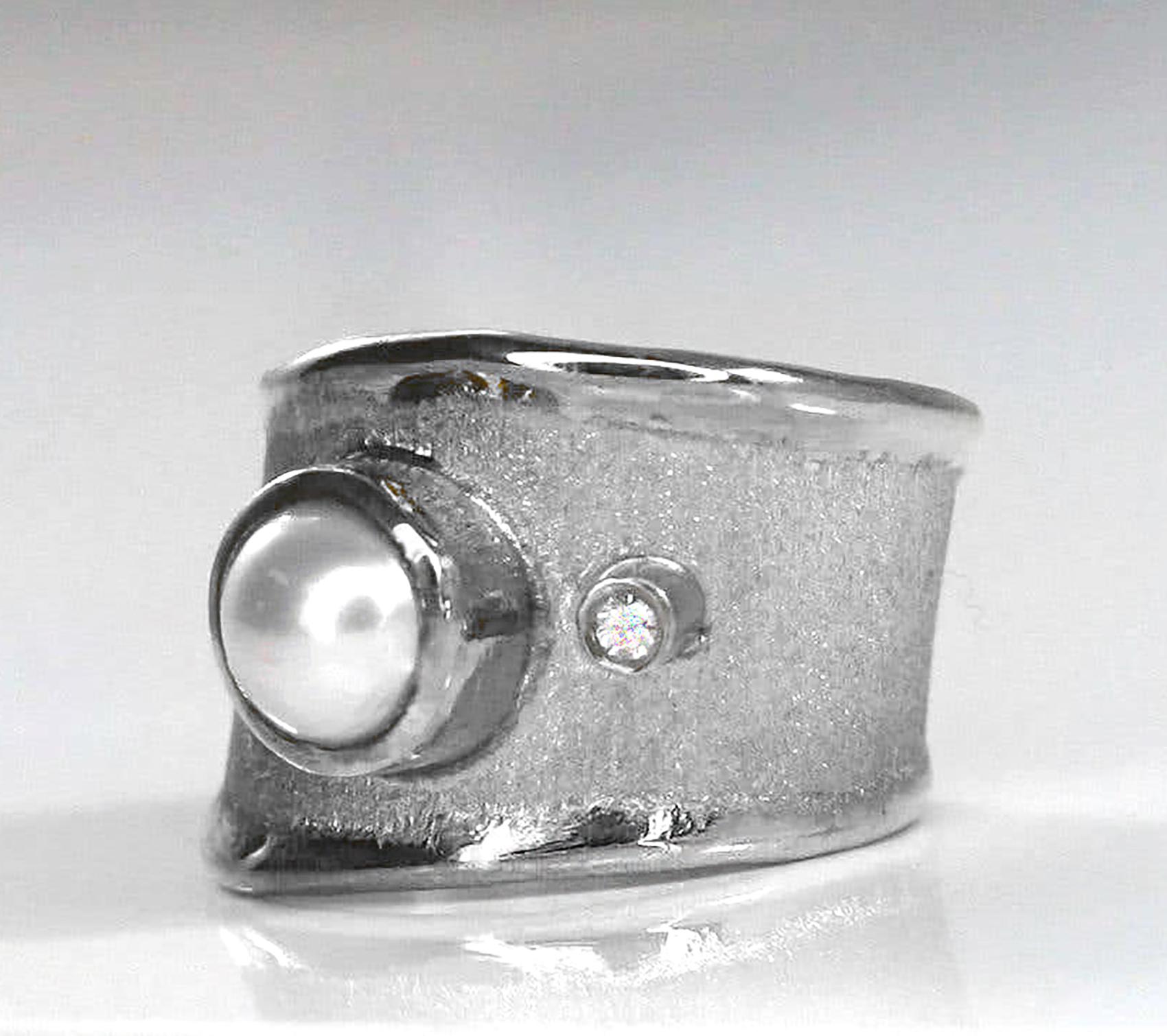 This is Yianni Creations artisan ring crafted from fine silver 950 purity for our AMMOS Collection. This ring was handmade in Greece in exquisite quality.  The silver is plated with palladium to protect the ring from the elements. The ring features