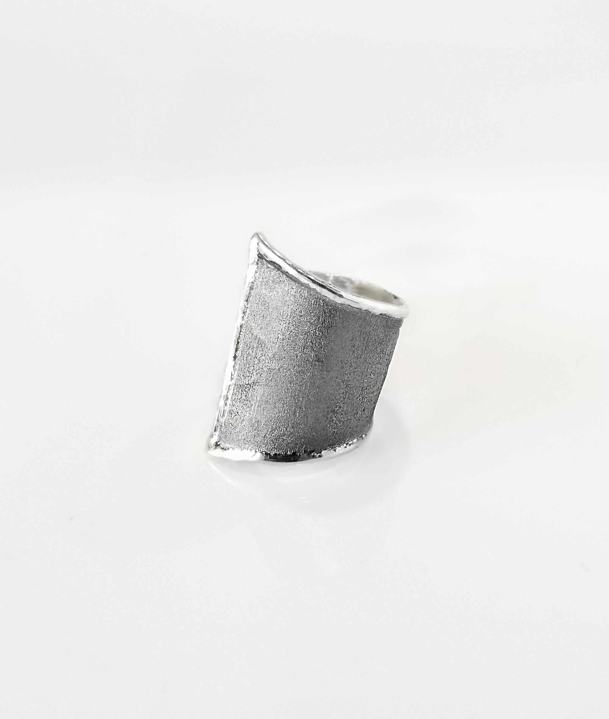 Yianni Creations Hephestos Collection 100% Handmade Artisan Ring from Fine Silver. The ring features unique oxidized Rhodium background complemented by unique techniques of craftsmanship - brushed texture and nature-inspired liquid edges. The core