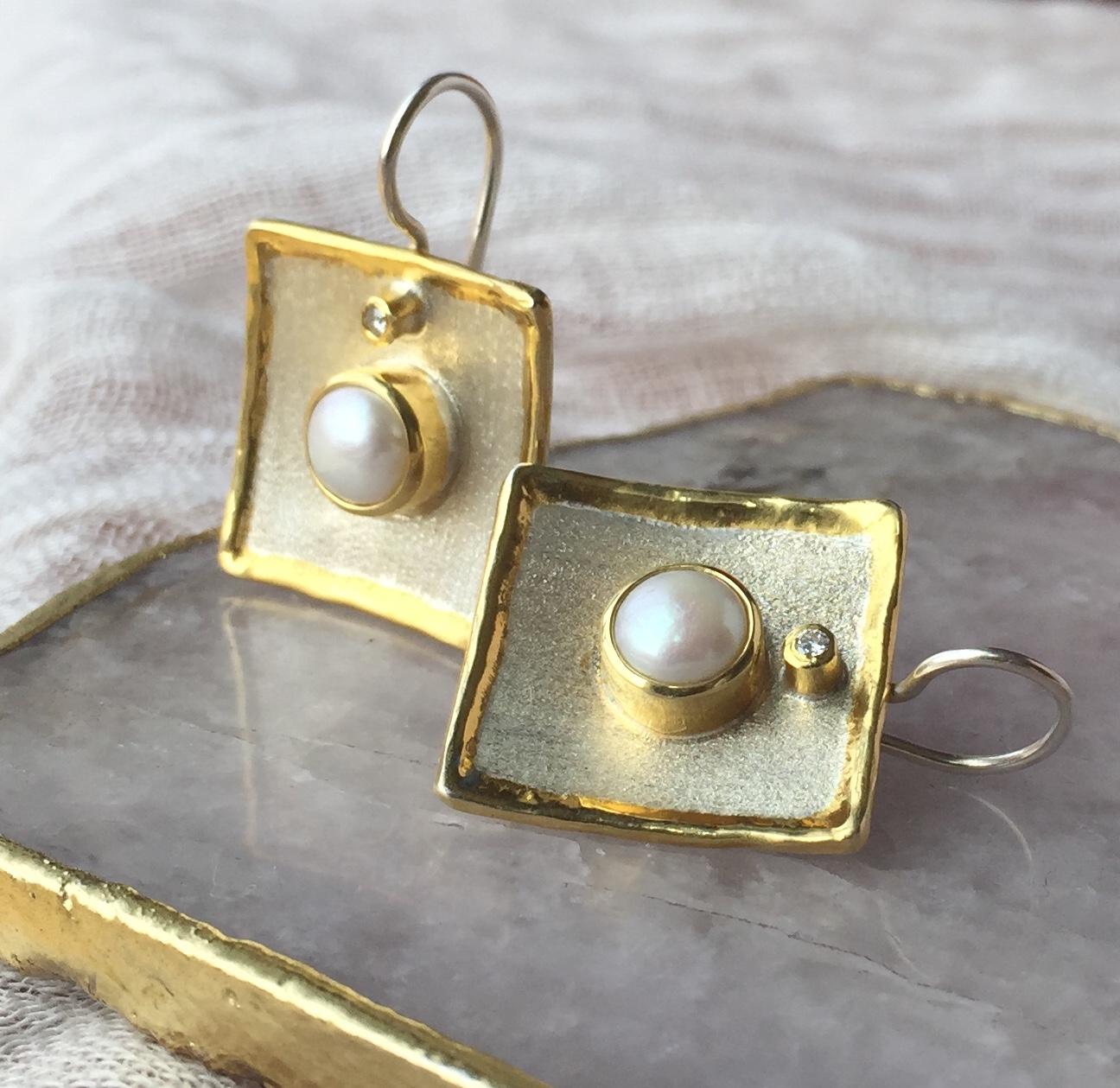 These are Yianni Creations handmade artisan earrings from Midas Collection crafted in Greece from fine silver 950 purity and plated with palladium to resist the elements. These square-shaped dangle earrings feature 7MM freshwater pearl accompanied