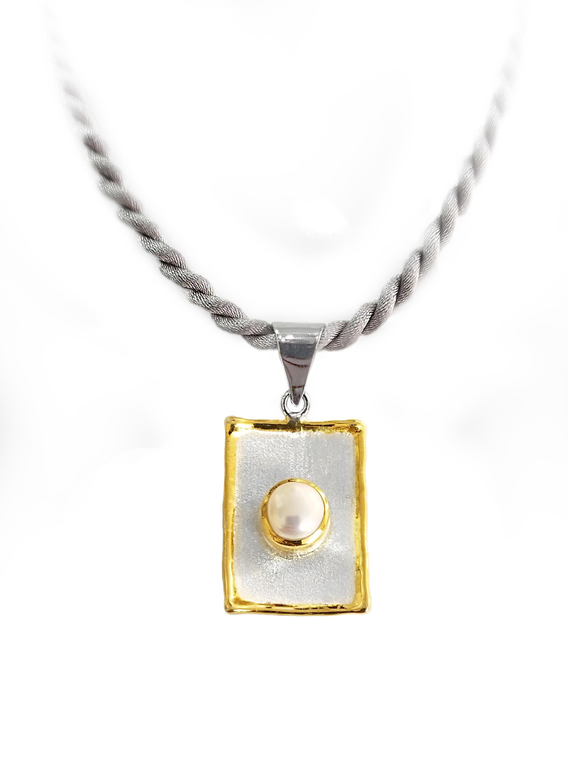 Yianni Creations Midas Collection 100% Handmade Artisan Pendant from Fine Silver with a layover of 24 Karat Yellow Gold features 8mm Freshwater Pearl complemented by unique techniques of craftsmanship - brushed texture and nature-inspired liquid