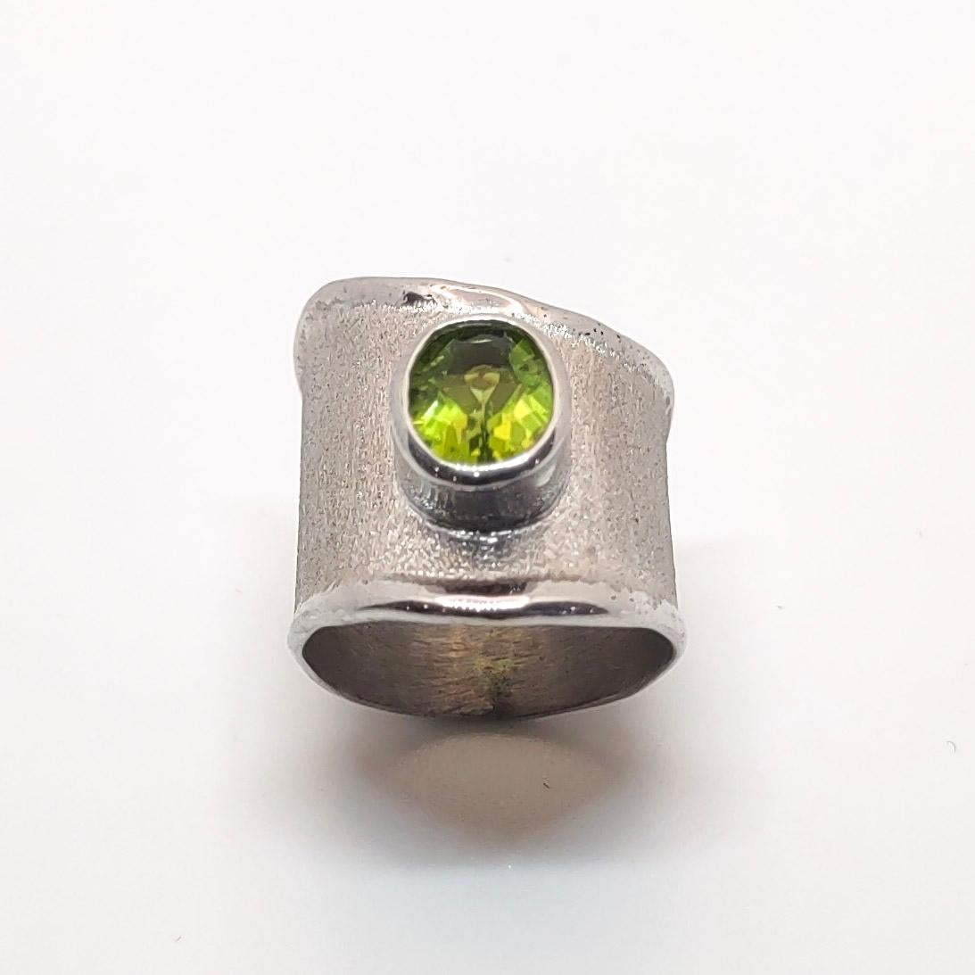 Oval Cut Yianni Creations Peridot Ring in Fine Silver and Palladium For Sale