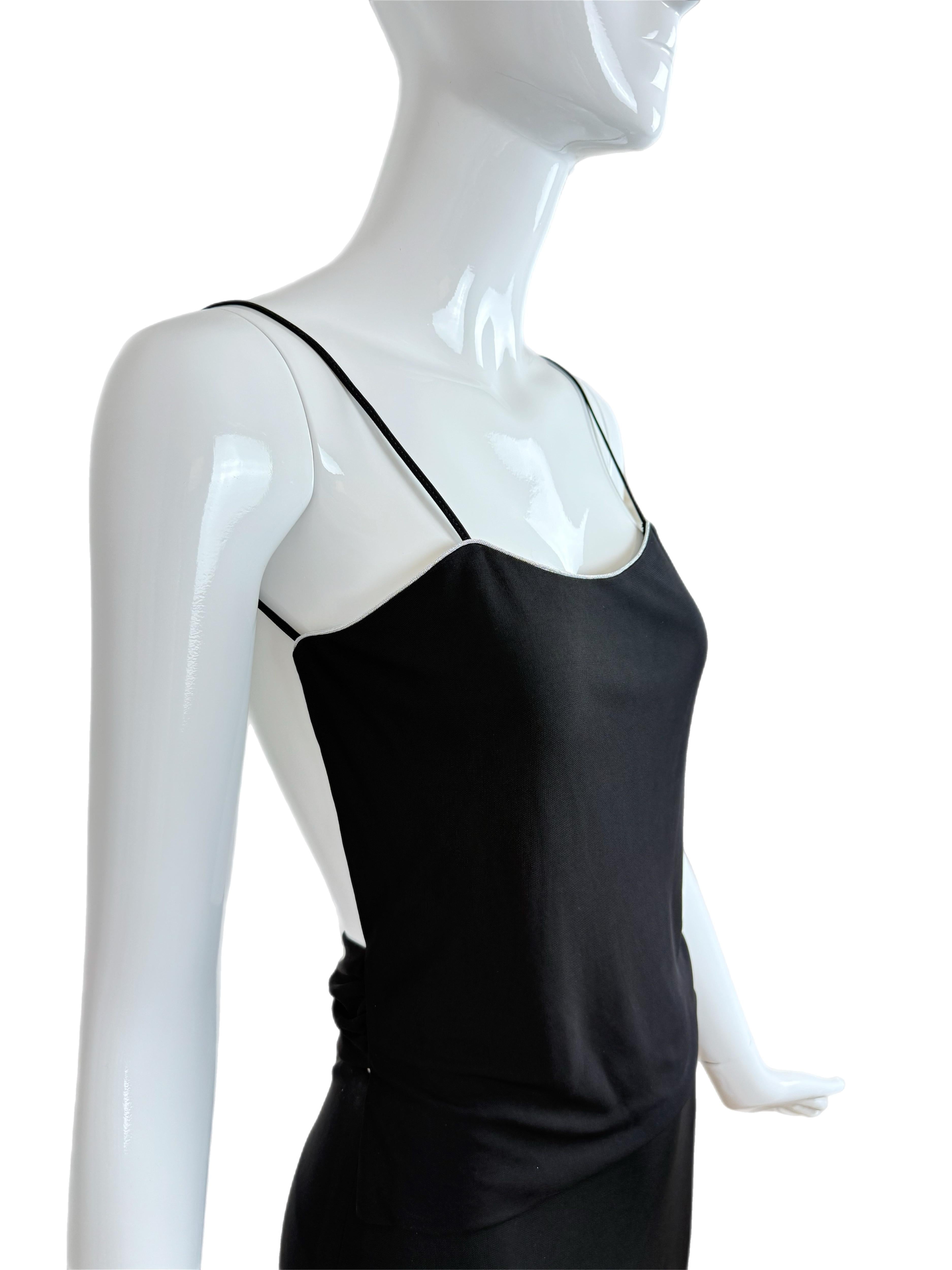 Yigal Azrouel
Late 90's to early 00's
Vintage
2 pieces skirt (side zip) and camisole (pullover)
Jet black with silver trim
Size 1 (please see below measurements for sizing)
*Pristine with the exception of some stitching coming undone on the inside