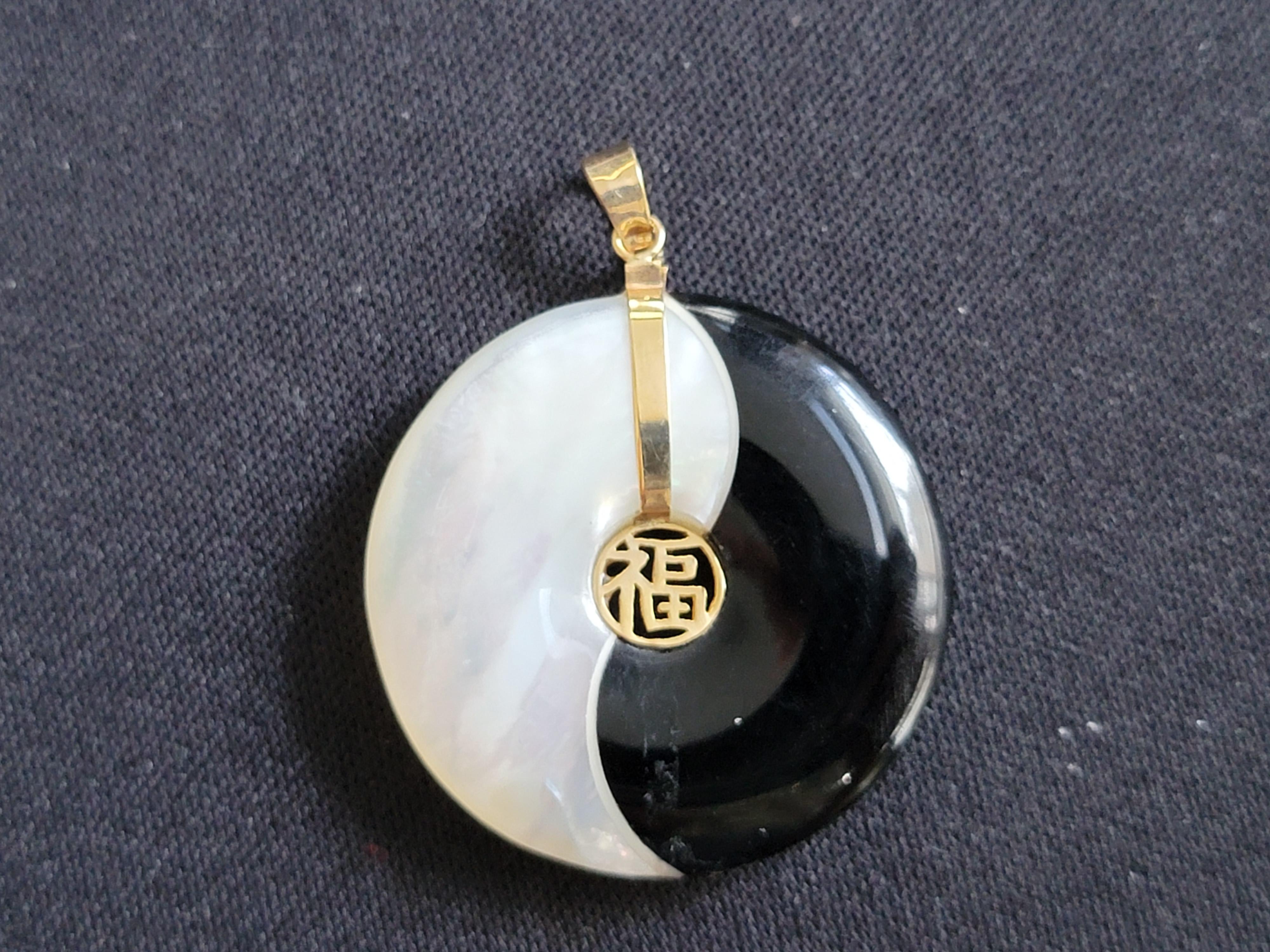 The 'Yin and Yang Fortune (Dynamic Edition) Pendant' is a new iteration of our best-selling Yin and Yang Fortune Pendant. This edition has curved lines, and glossier finishes to show a smooth flow and active aura. We add the character for 'Luck' and