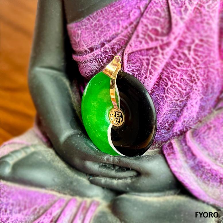 The Yin and Yang Green Jade/ Black Onyx Donut shaped Fortune Pendant is an eclectic creation, symbolizing the two drivers of success in ancient Chinese folklore, balance and fortune. A Solid 25mm Diameter is perfect to stand out yet be subtly