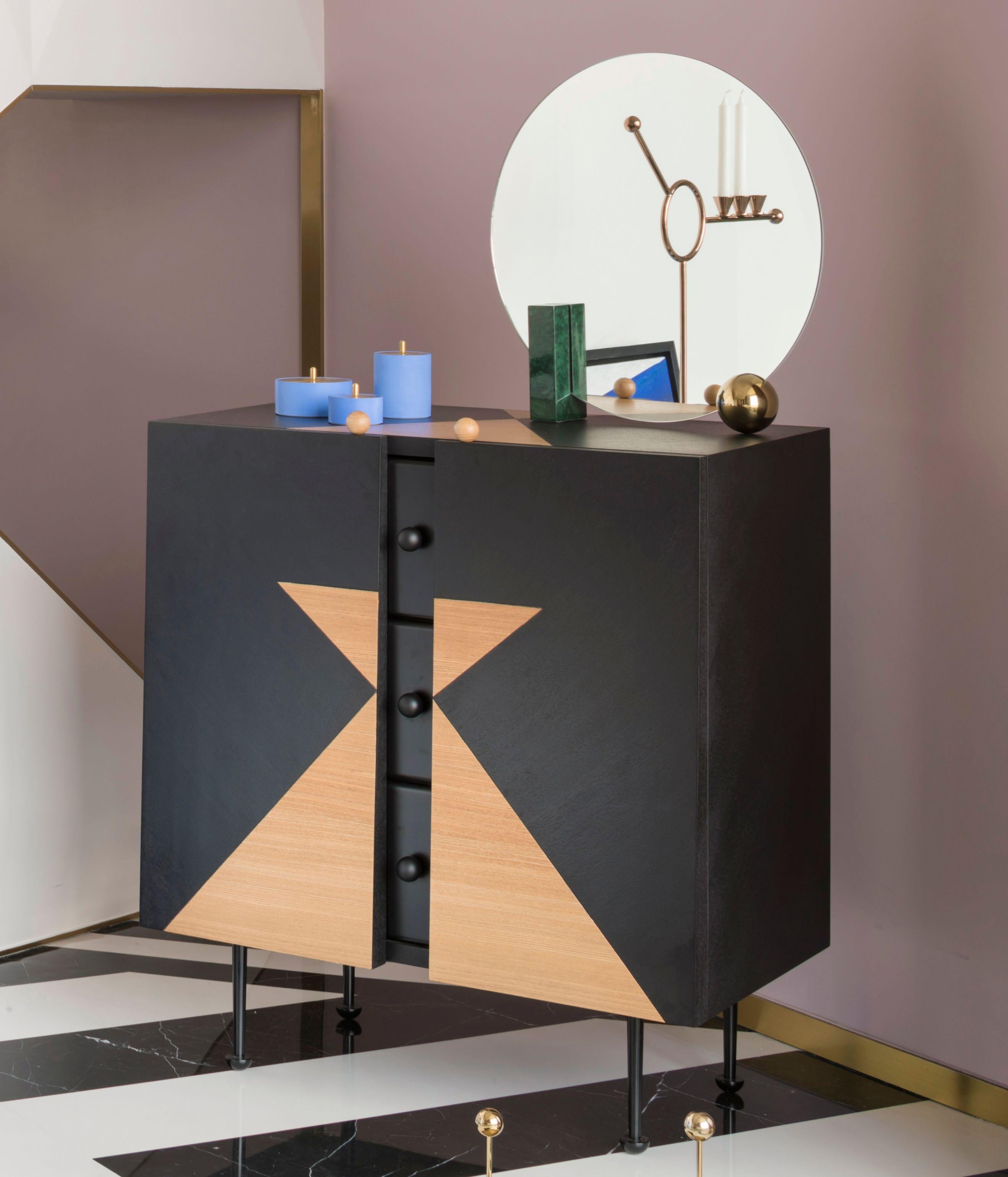 Yin-Yang chest drawers designed by Thomas Dariel, Maison Dada
Measures: W 80 x D47 x H93 cm
Body in painted and natural ash veneer • front in matte paint ?nish
Structure in MDF • Inside drawers painted in black matte ?nish
Metal legs with black