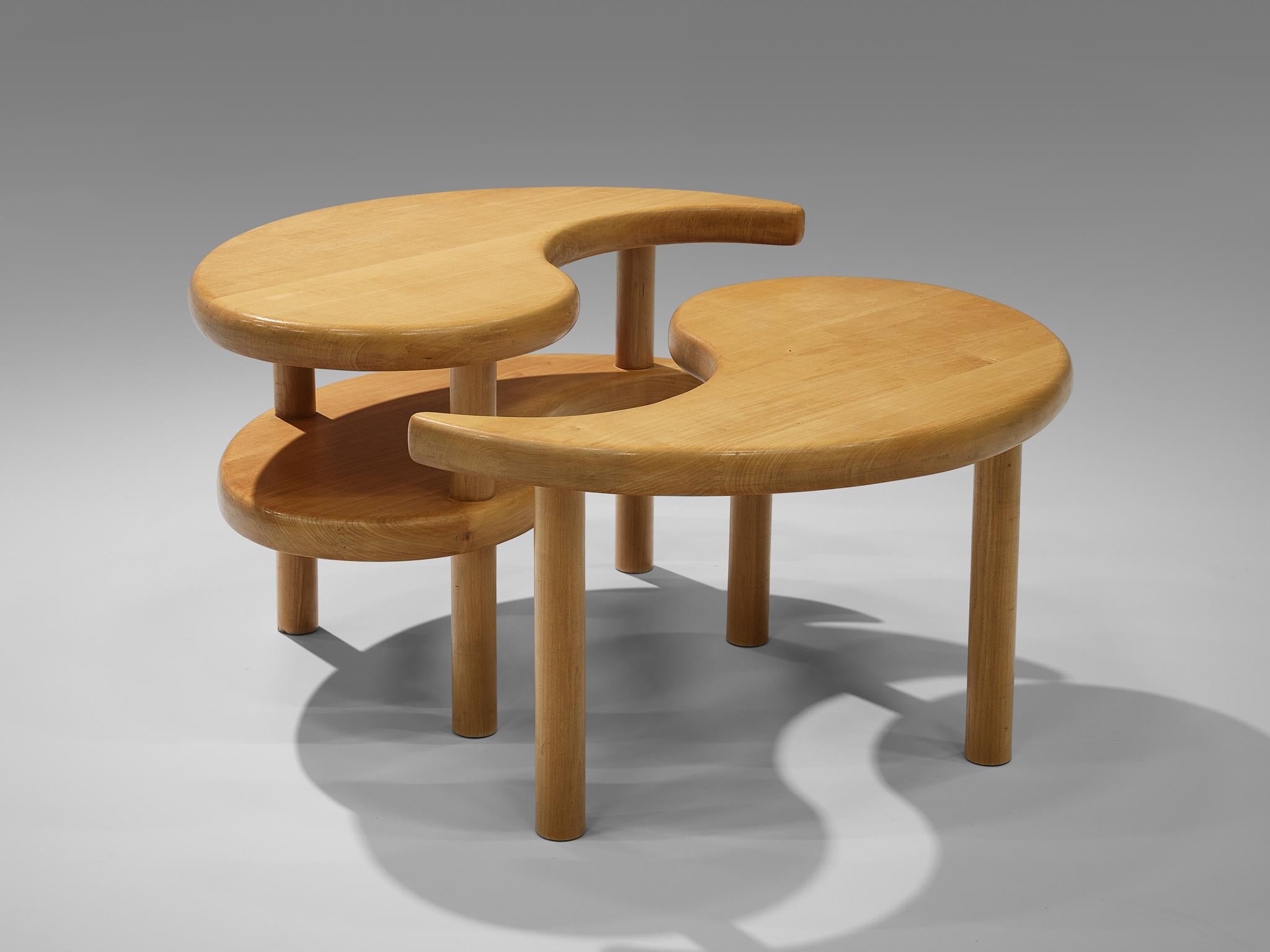 Side table in two parts, beech, Scandinavia, 1960s

The symbol of the Chinese Yin and Yang symbol seems to be the inspiration of this design. On three different levels the symbol is repeated while three round legs lift the comma-shaped tabletops up.
