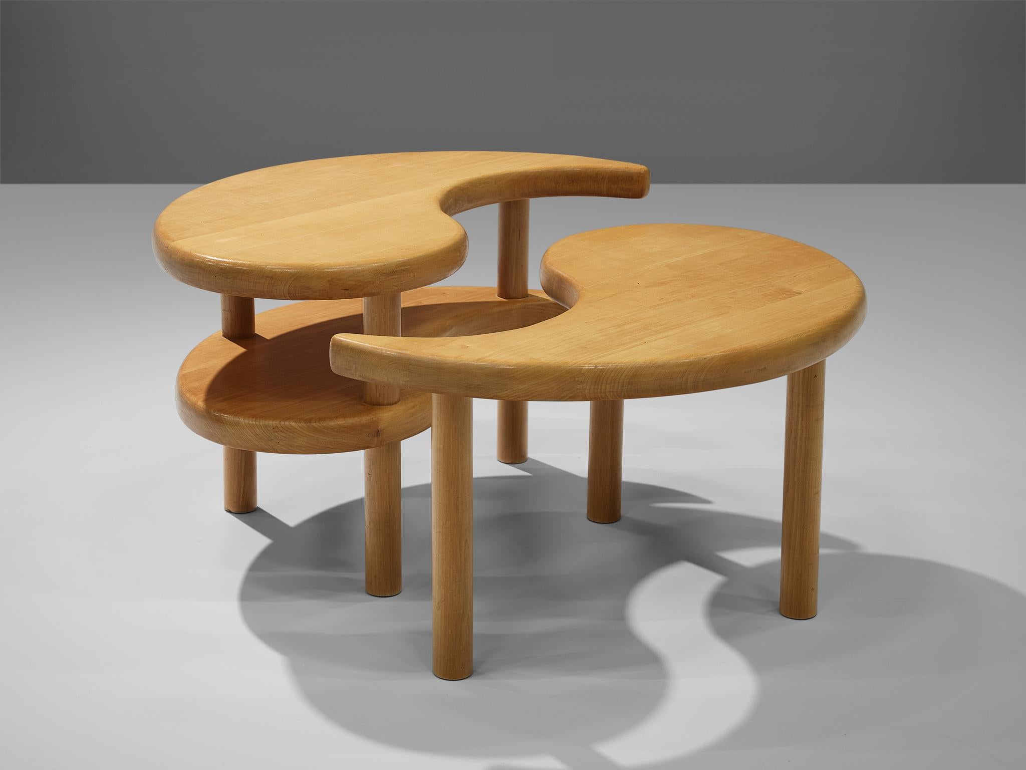 Side table in two parts, beech, Scandinavia, 1960s

The symbol of the Chinese Yin and Yang symbol seems to be the inspiration of this design. On three different levels the symbol is repeated while three round legs lift the comma-shaped tabletops