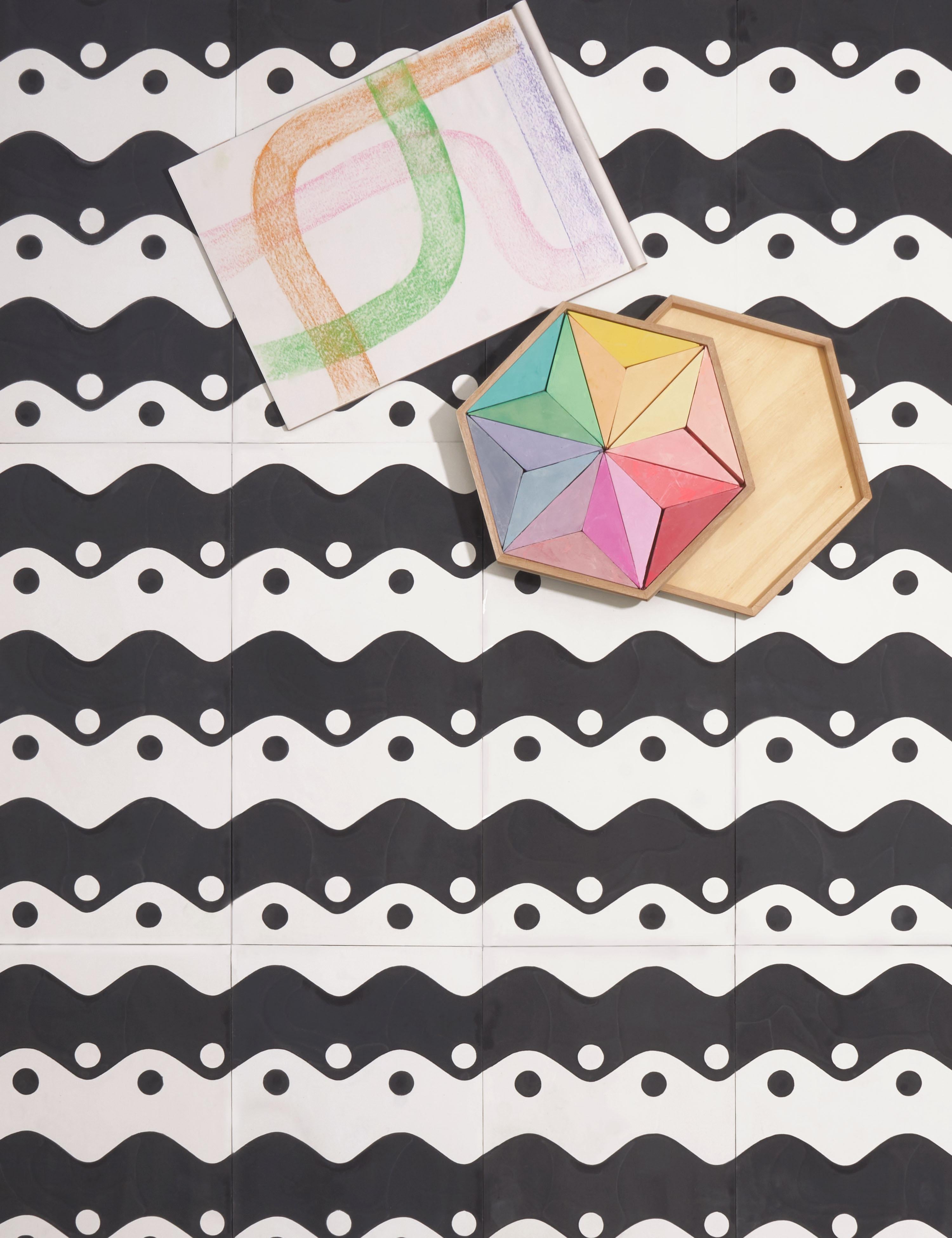 Ying is a groovy stripe design inspired by the positive/negative curves and dots of the Yin-yang.

Cement tiles
Type: Encaustic cement tile
Production process: Hydraulic pressing process
Materials: White cement, stone powder, additives, grey cement,