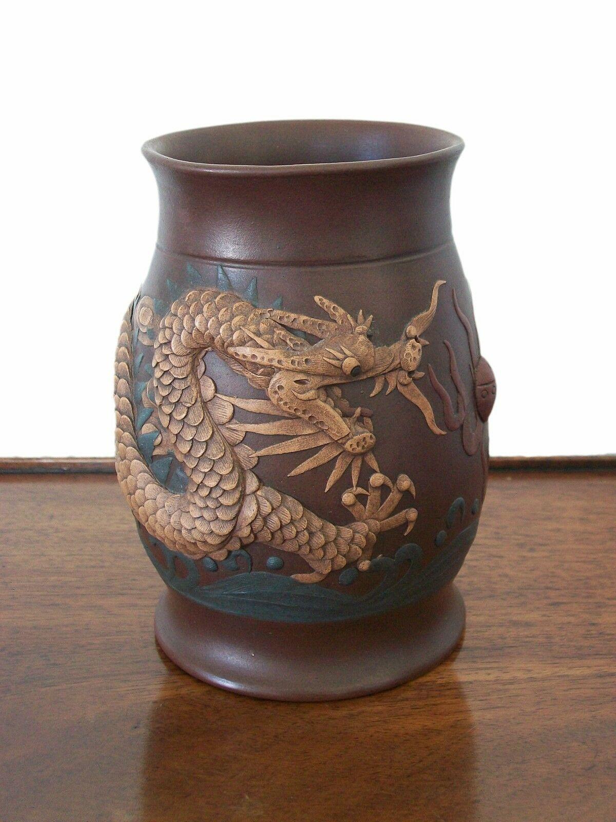 Rare museum quality Yixing Zisha 'Imperial Dragon' vase or brush pot - featuring an applied buff clay five clawed/twin horned scaly dragon in high relief chasing a flaming pearl of wisdom set against clouds and lapping waves - impressed square seal