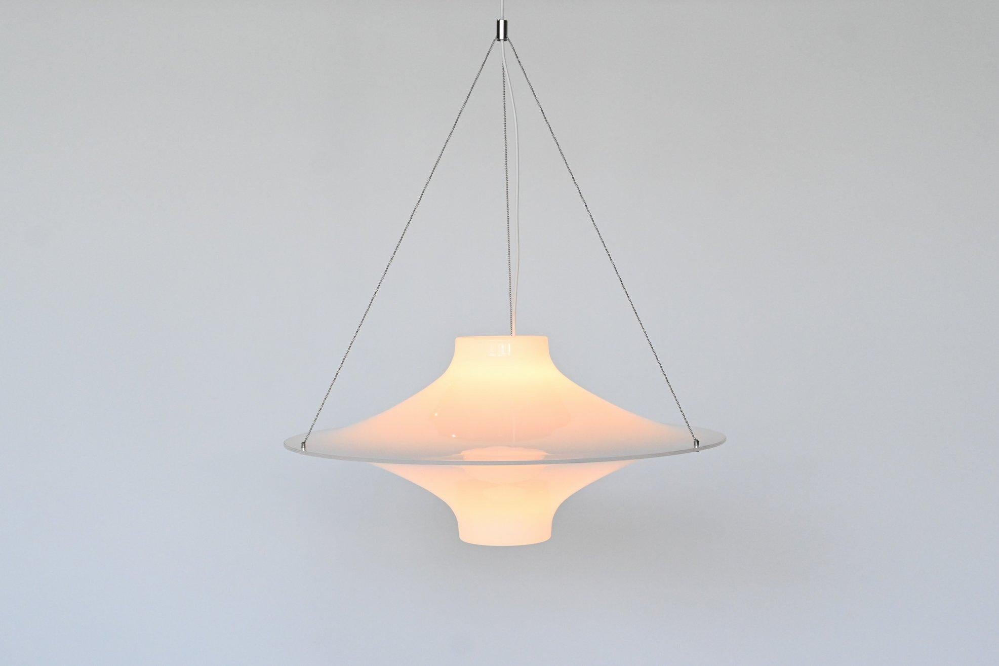 Very nice design classic pendant lamp model “Lokki / Sky Flyer” designed by Yki Nummi for Sanka, Finland 1959. The lamp is made of white and transparent acrylic and has a metal wire. This large size hanging lamp is very atmospheric when lit.