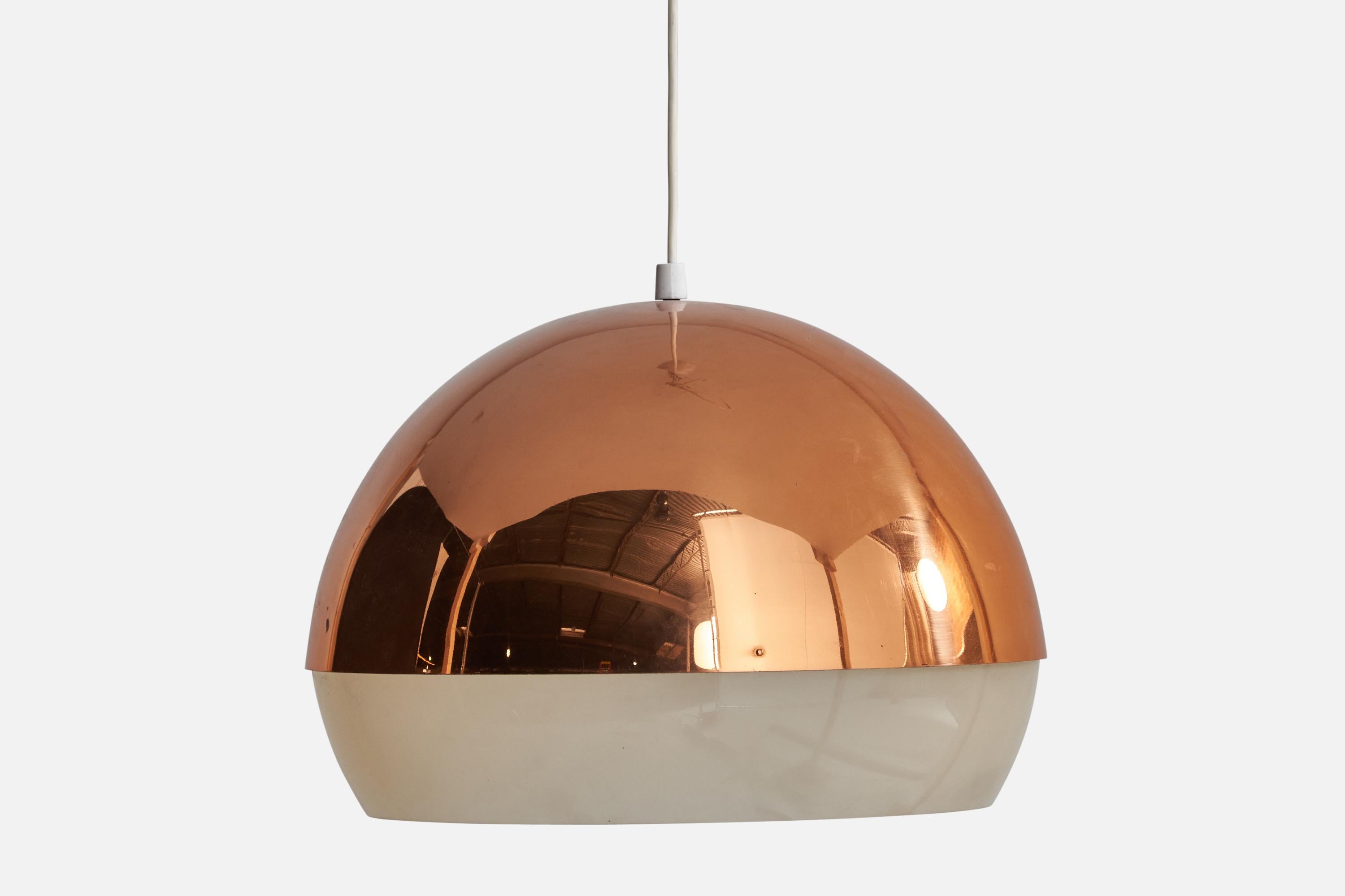 A copper and acrylic pendant light designed by Yki Nummi and produced by Orno, Finland, c. 1960s.

Dimensions of canopy (inches): 2.55” H x 3.5” Diameter
Socket takes standard E-26 bulbs. 1 socket.There is no maximum wattage stated on the fixture.