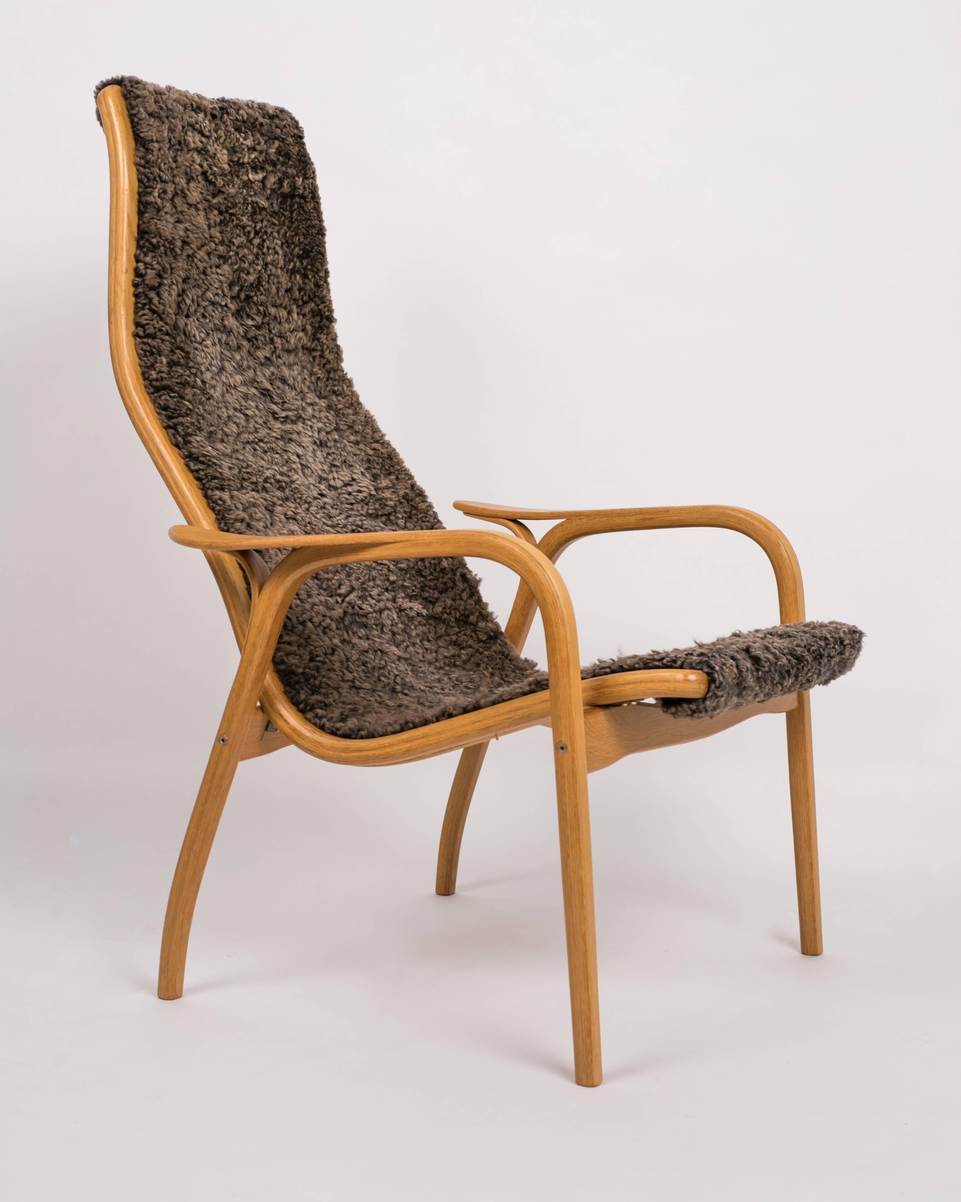 Laminated Yngve Ekström Lamino Chair and Ottoman with Sheepskin Upholstery