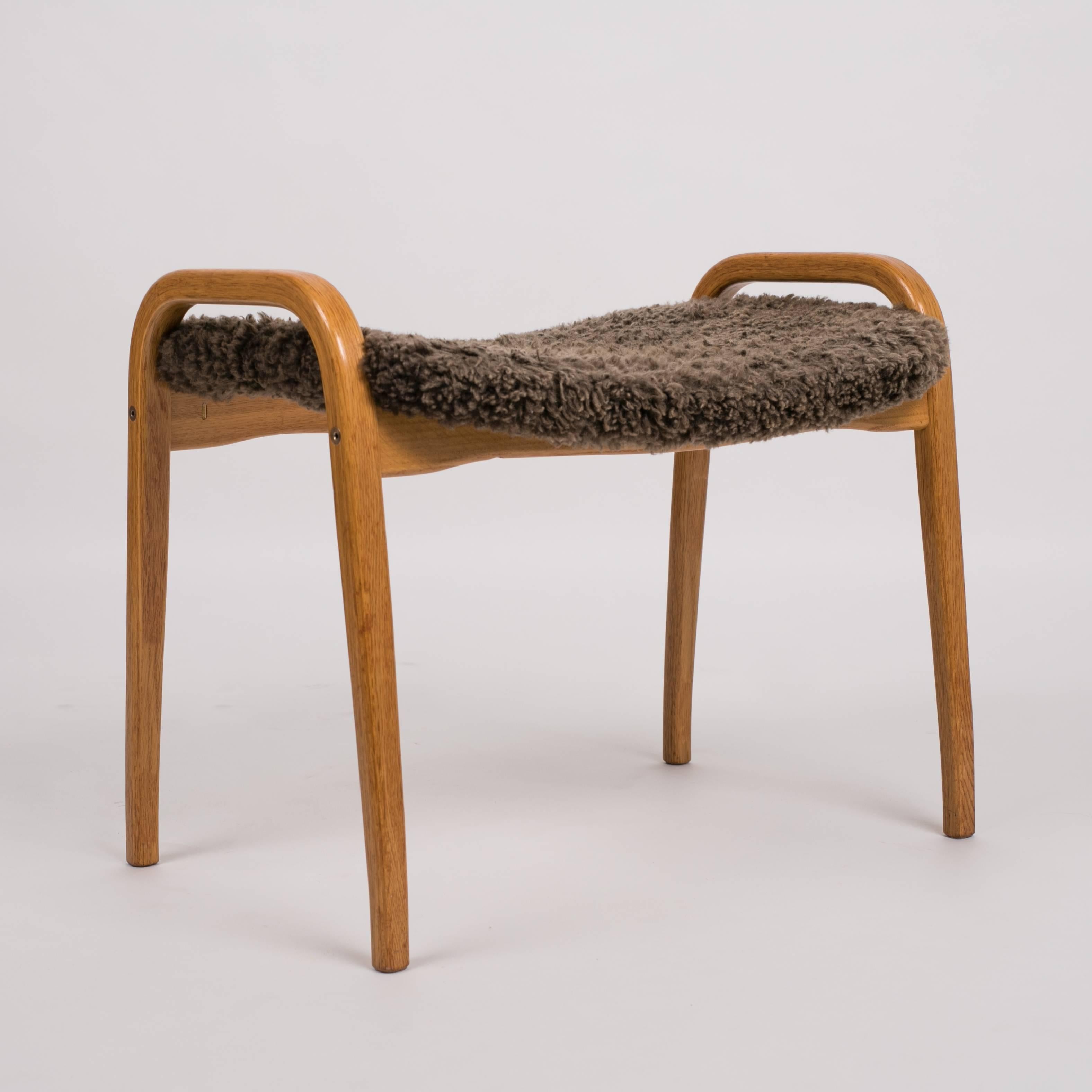 20th Century Yngve Ekström Lamino Chair and Ottoman with Sheepskin Upholstery