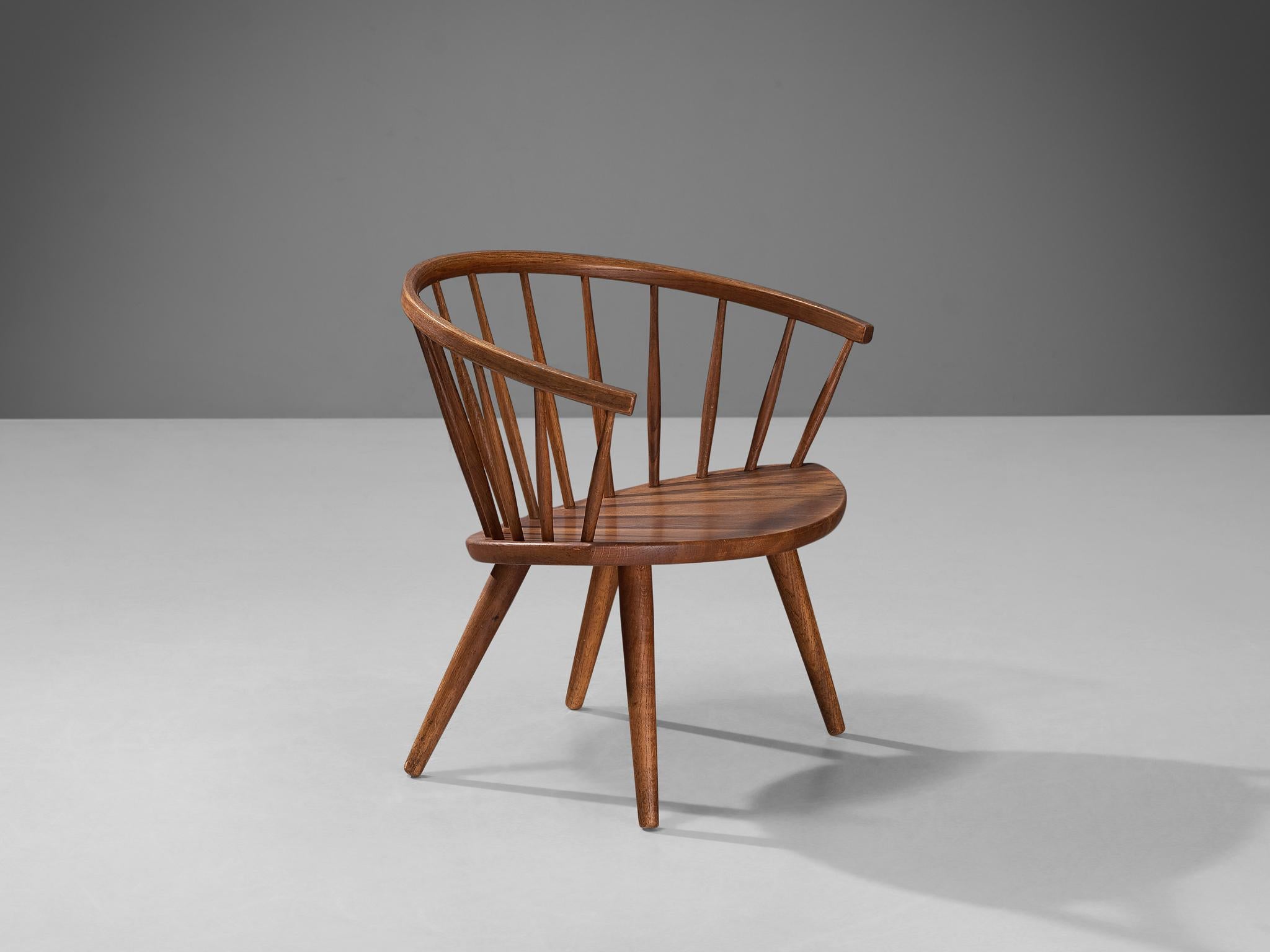Yngve Ekström for Stolab, 'Arka' armchair, oak, Sweden, 1955

This armchair is a prime example of Scandinavian Mid-Century design ideology. This spindle back chair is known for its comfort and durability with a very elegant look from every point of
