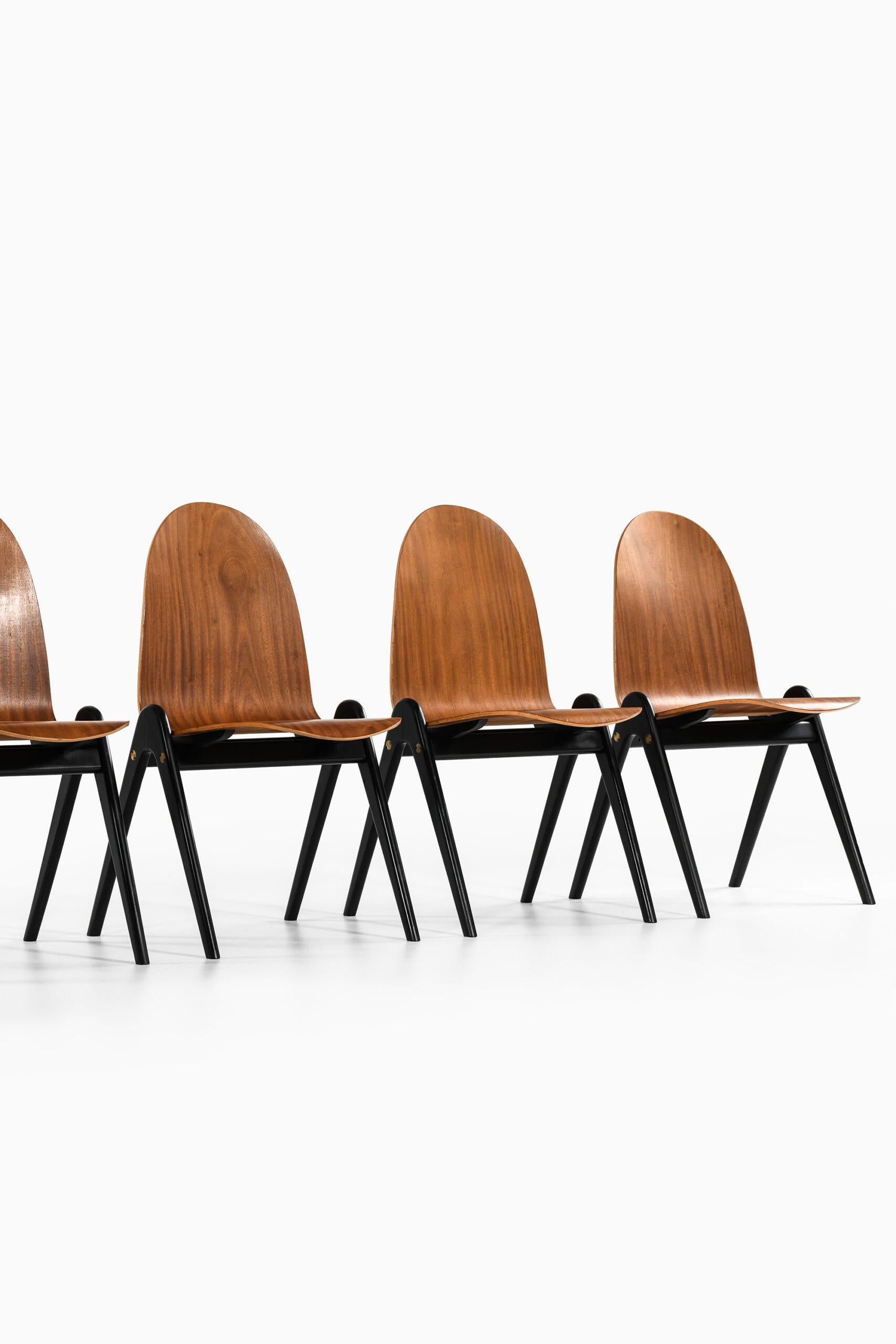 Rare set of 8 dining chairs ‘Knockdown’ designed by Yngve Ekström. Produced in Sweden.