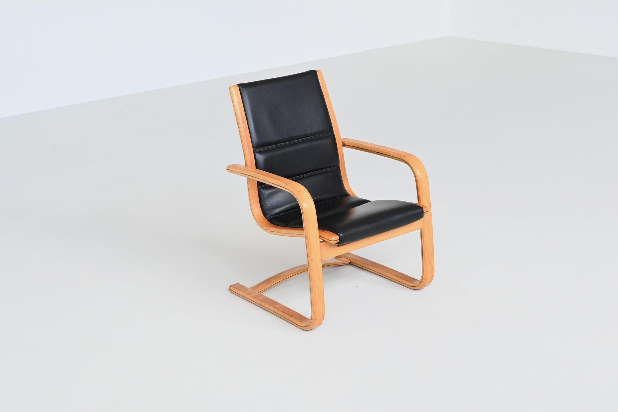 Beautiful shaped pair of lounge chairs model “Lamello” designed by Yngve Ekström for Swedese, Sweden 1960. Wonderfully curved frame made of solid beech with the high-quality original leather cover in black. The chair has perfect proportions and