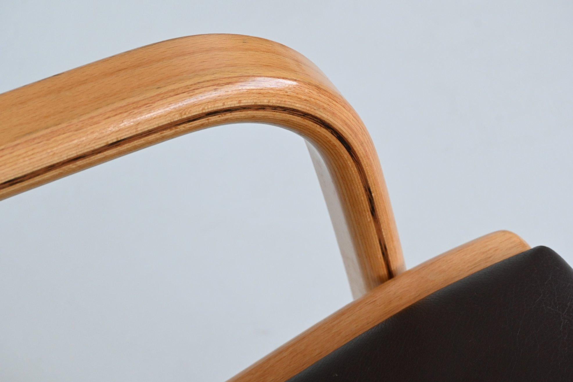 Leather Yngve Ekstrom Lamello lounge chair in black leather Swedese Sweden 1960
