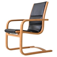 Yngve Ekstrom Lamello lounge chair in black leather Swedese Sweden 1960