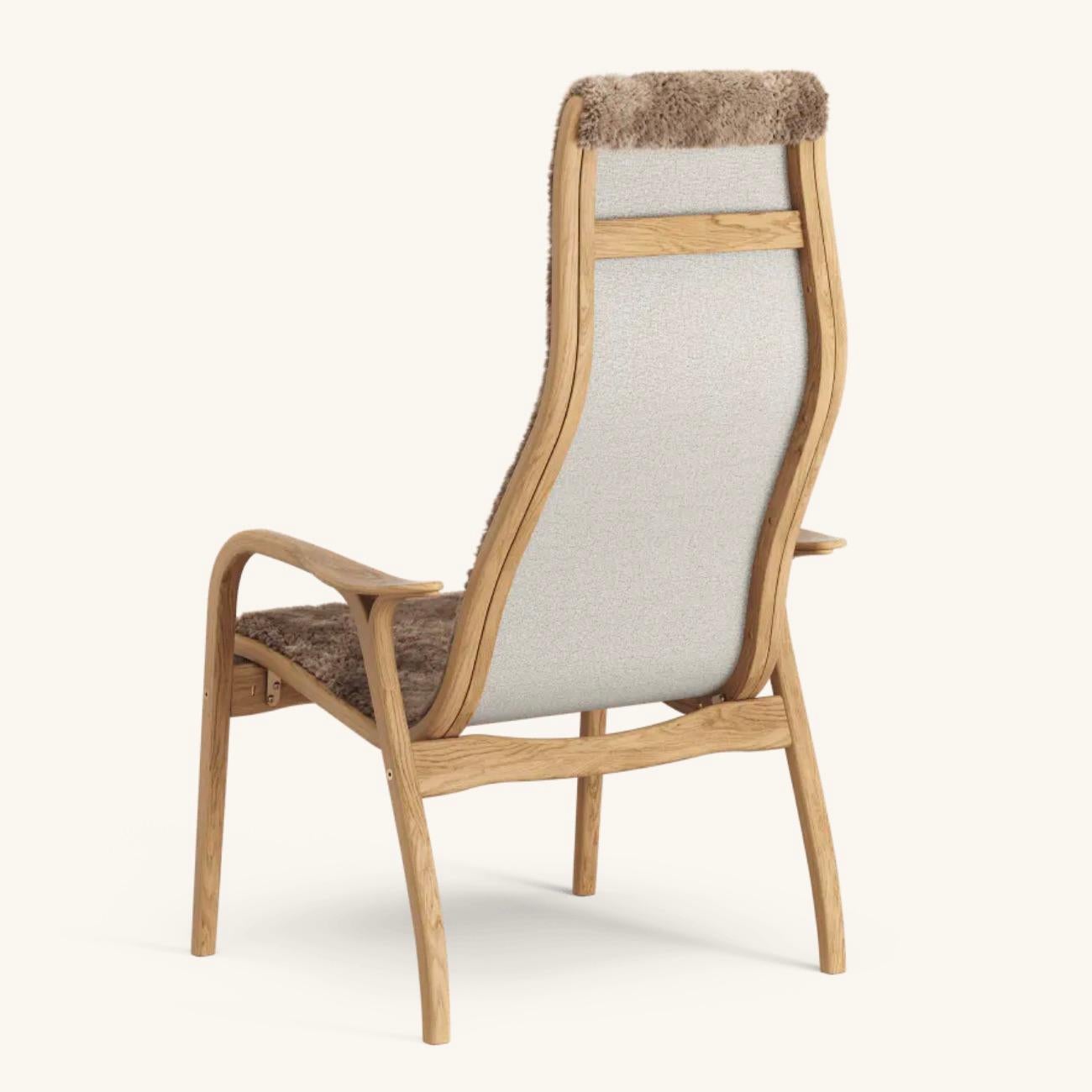 Scandinave moderne Fauteuil Lamino Yngve Ekstrm de Swedese en chêne et peau de mouton « Sathara » en vente