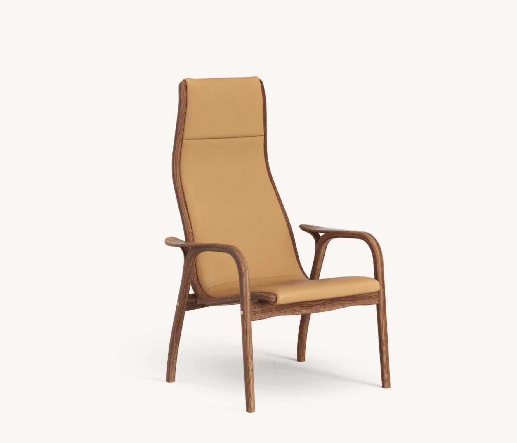 Yngve Ekström Lamino Sessel von Swedese in Nussbaum und Cognac Leder 'Elmo Baltique 43001'. Neu, Entwurf von 1956.

Der Lamino von Yngve Ekström ist einer der kultigsten skandinavischen Sessel. Dieser 1956 entworfene Stuhl ist nie aus der Mode