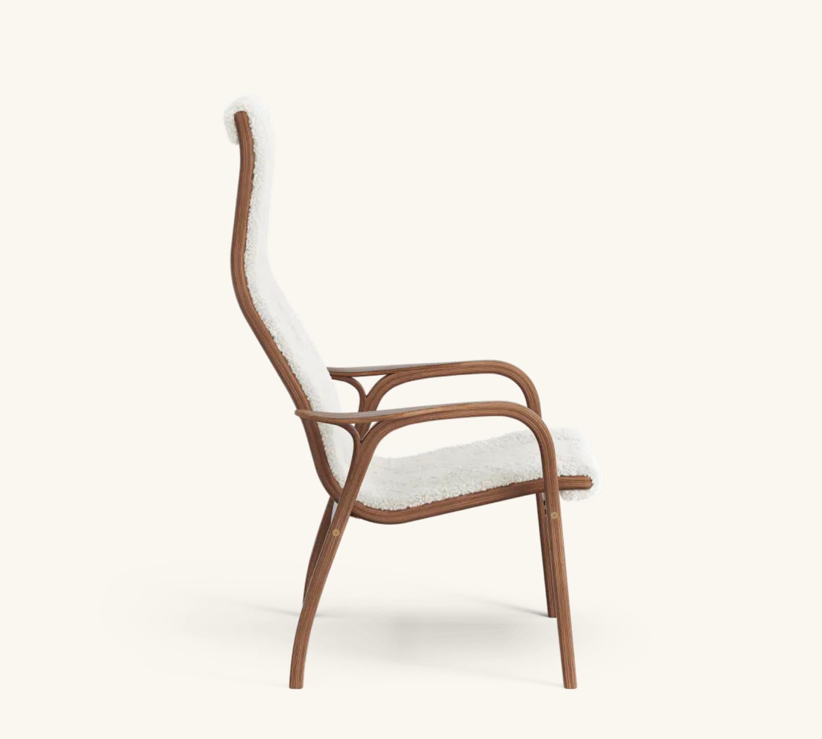 Yngve Ekström Lamino Easy Chair von Swedese in Nussbaum und Schafsleder 'Off White'. Neu, Design von 1956.

Der Lamino von Yngve Ekström ist einer der kultigsten skandinavischen Sessel. Dieser 1956 entworfene Stuhl ist nie aus der Mode gekommen.