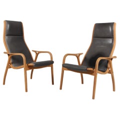 Yngve Ekström, "Lamino" Pair of Lounge Chairs, patinated leather