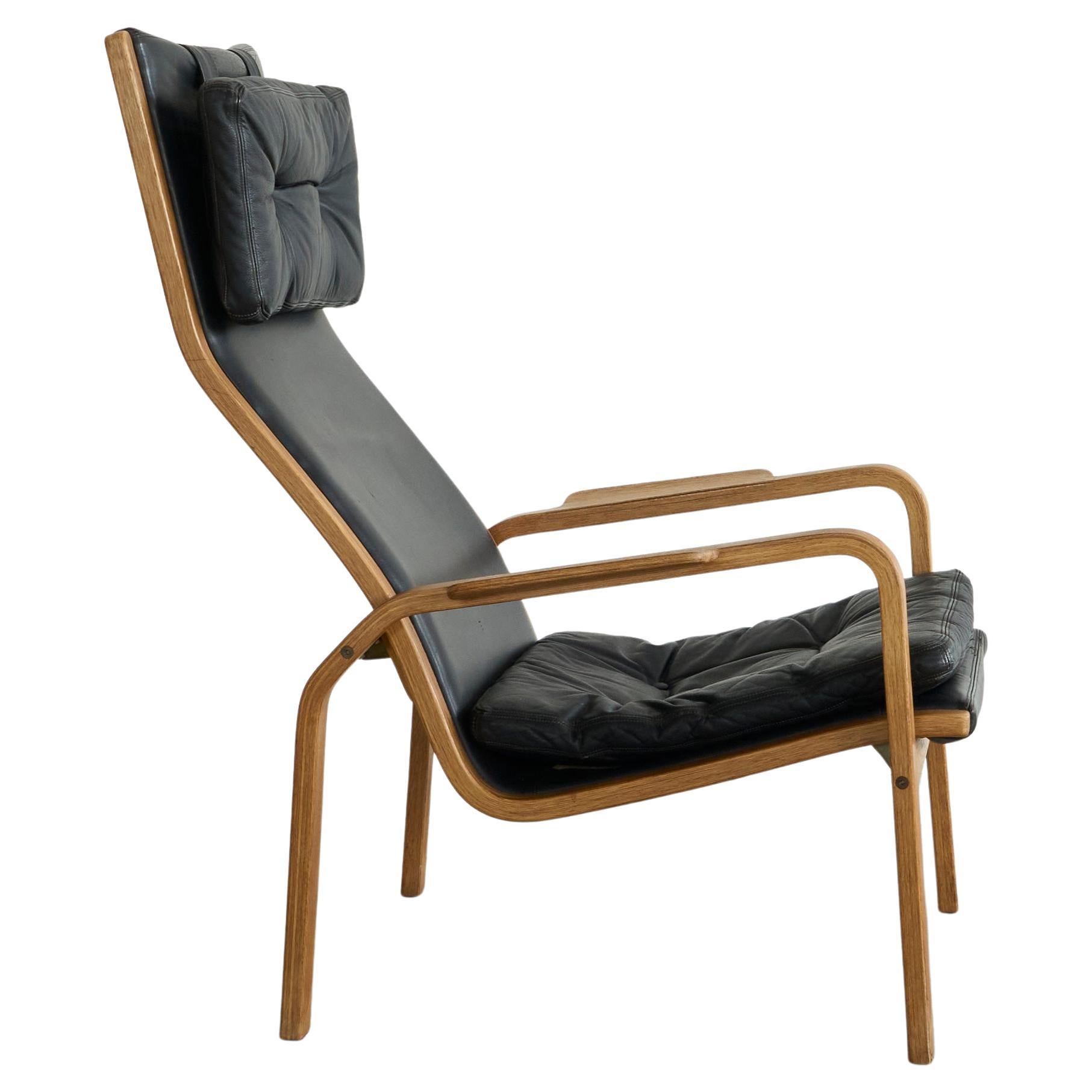Chaise longue Yngve Ekström en bouleau massif et cuir noir pour Swedese 1970 en vente