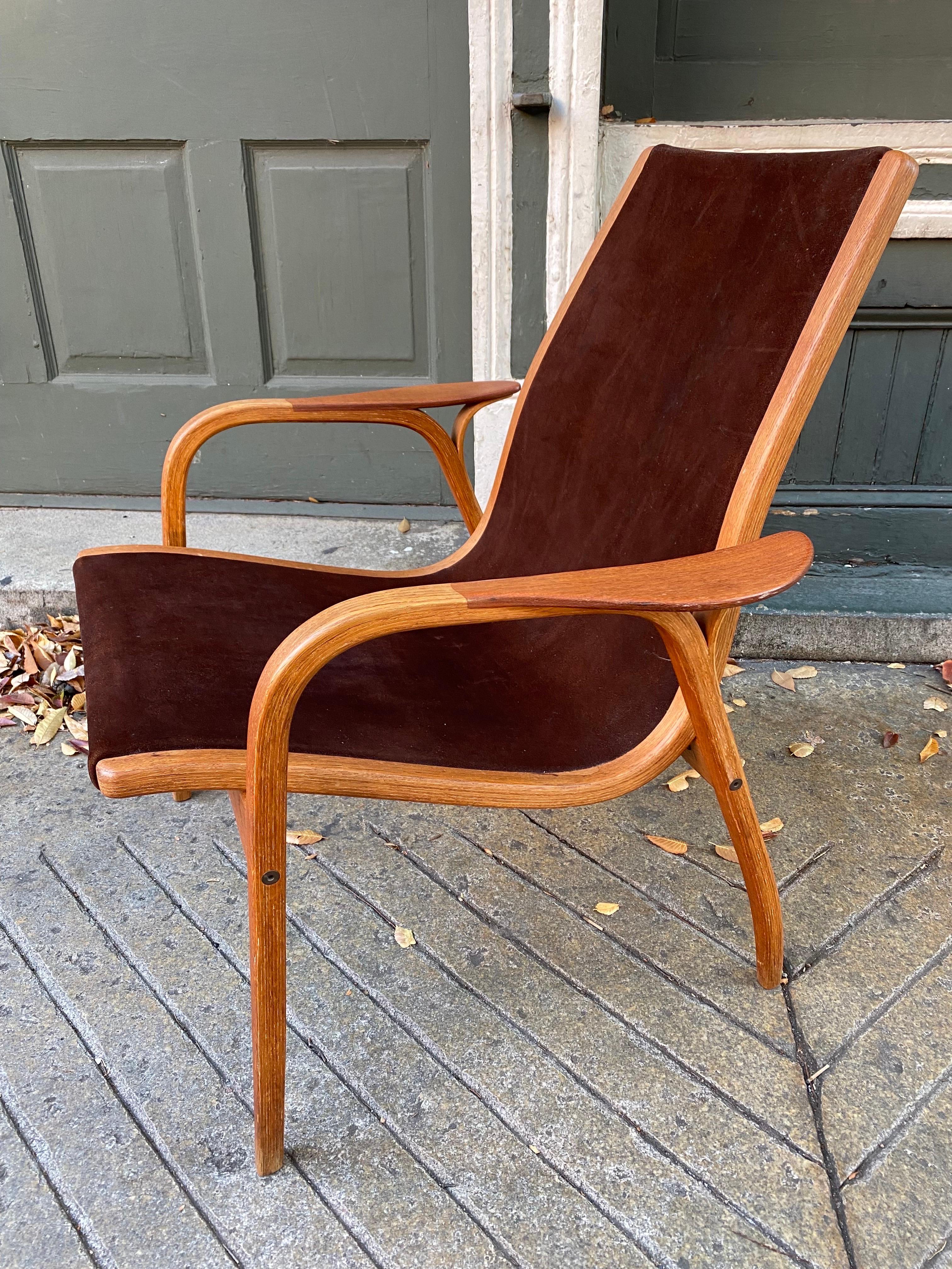Low Back Yngve Ekstrom Lamino Chair in Brown Leather.  Very Nice Condition!  This one sat in the corner of a formal Living Room so saw very little use!  Bent Oak Frame with Teak Armpads.  Several Lamino Chairs available!