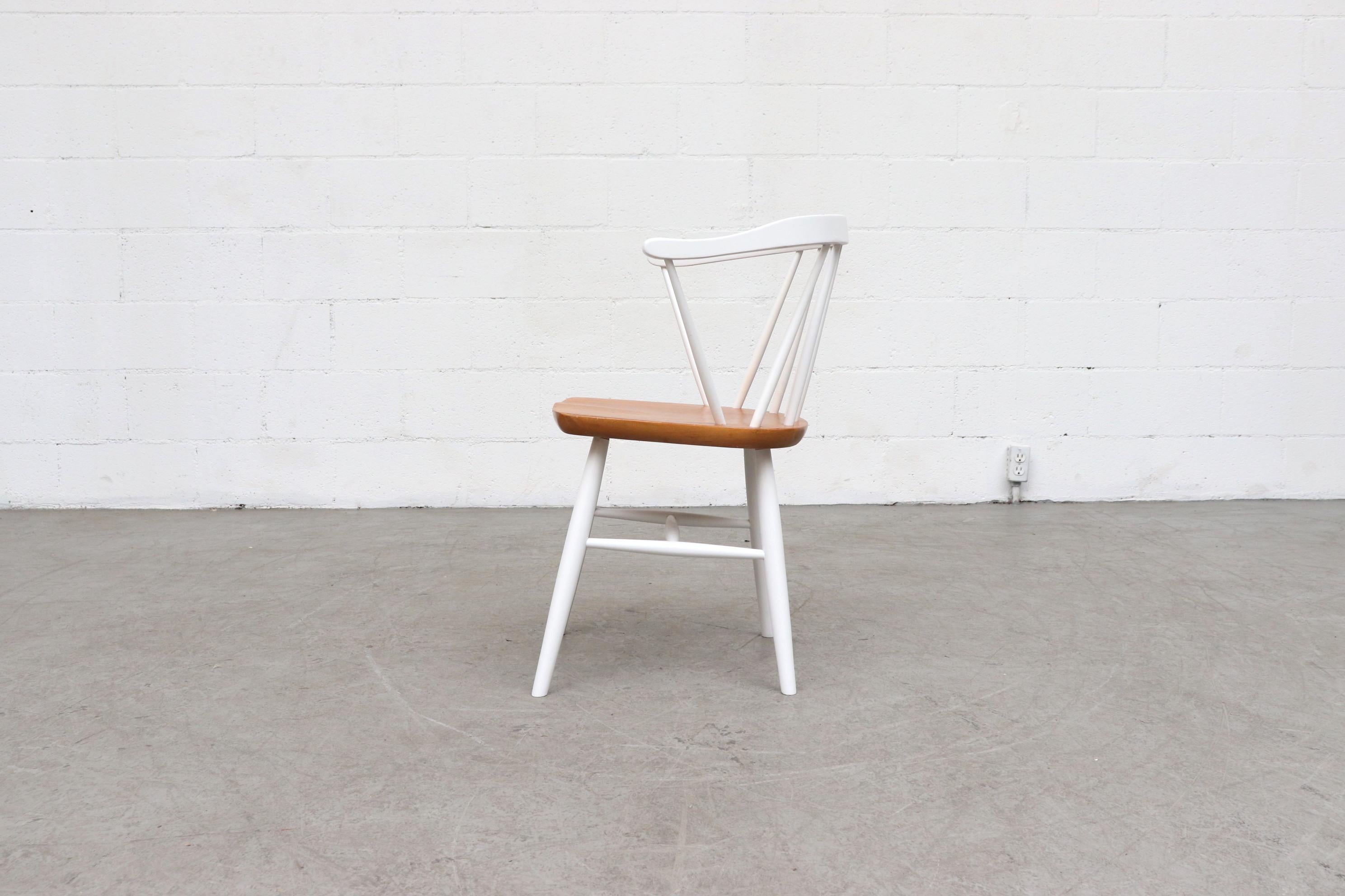 white spindle back chairs
