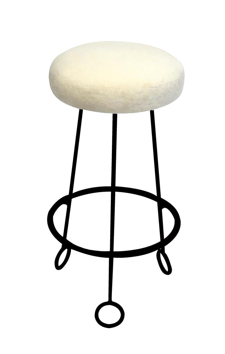 'Yo-Yo' stool in the manner of Jean Royère. Handcrafted in the Los Angeles and Parisian workshops of noted French designer and antiques dealer Denis de le Mesiere, who pays homage to the work of Jean Royère with scrupulous attention to detail and