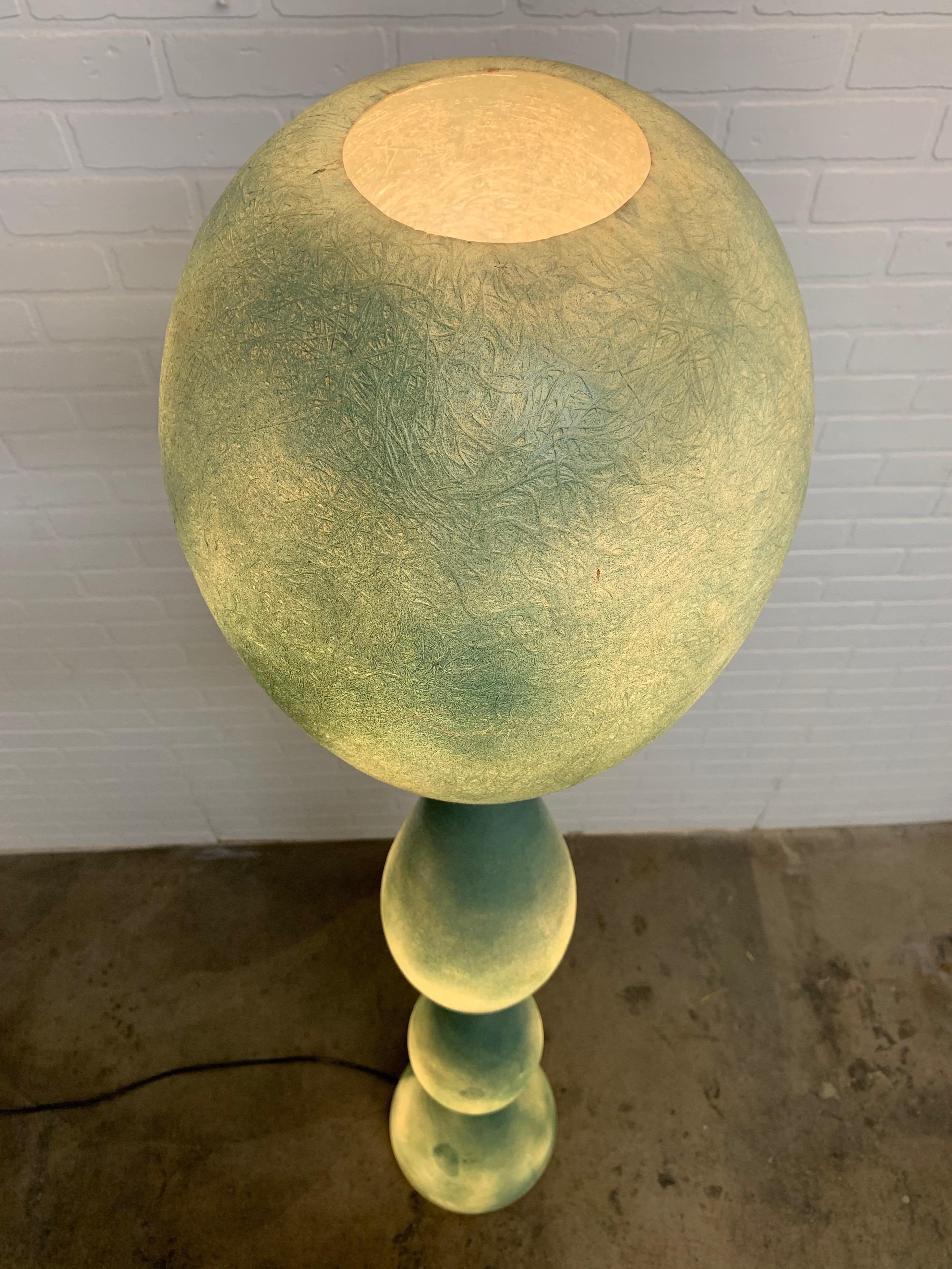Illuminated green sage sculpted fiberglass floor lamp by Guglielmo Berchicci for Kundalini
These were originally purchased for a prop house in Los Angeles. Seen in many Hollywood productions.
   