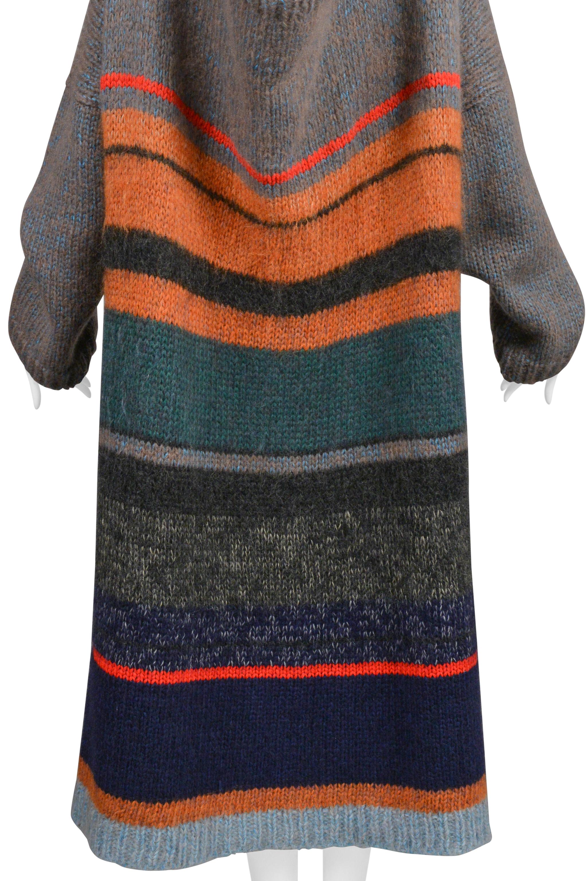 Resurrection Vintage is excited to present a vintage Yohji Yamamoto oversized mohair sweater featuring an open neckline, snap front, bold stripes, easy body and 3/4 length.
* Yohji Yamamoto
* Size: Medium 
* Laine Wool
* 1998 Collection 
* Excellent