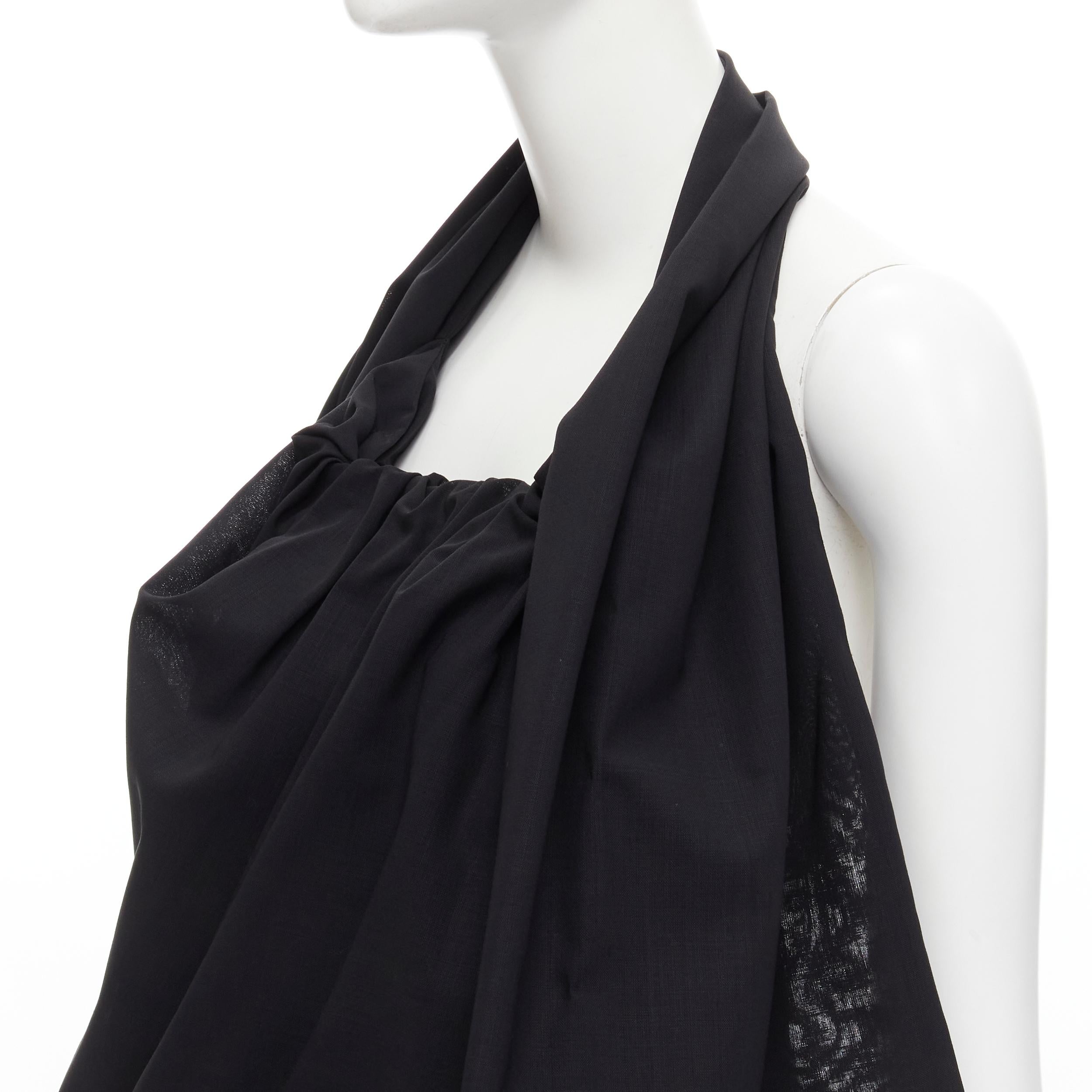 YOHJI YAMAMOTO 2012 Runway metal ring halter top transformable bag Very Rare 
Reference: CRTI/A00586 
Brand: Yohji Yamamoto 
Collection: 2002 Runway 
Color: Black 
Pattern: Solid 
Extra Detail: This top can be worn as a halter top or transformed to
