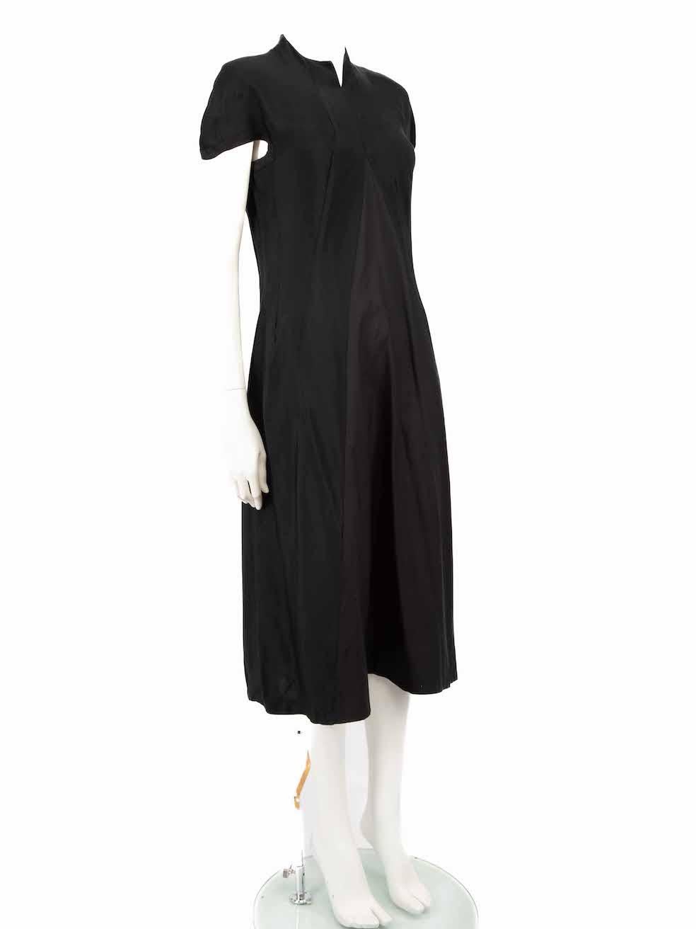 CONDITION is Very good. Minimal wear to dress is evident. Minimal pull thread to weave to front neck, right shoulder, rear neck and rear hip on this used Yohji Yamamoto designer resale item.
 
 
 
 Details
 
 
 Black
 
 Viscose
 
 Dress
 
 Short cap