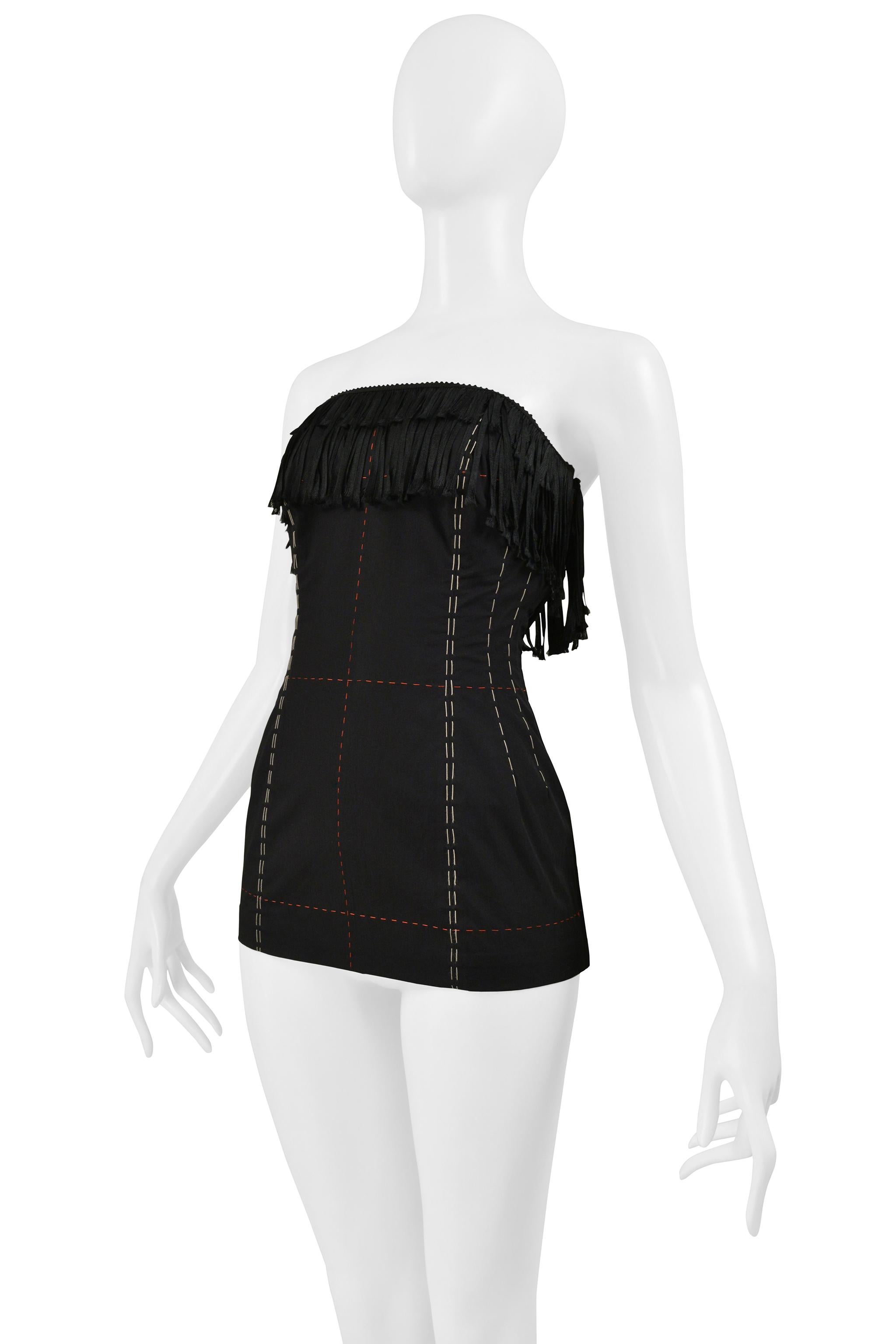 Resurrection is pleased to offer this vintage Yohji Yamamoto black cotton corset top featuring a square neckline, decorative white and red stitching, and black fringe.

* Yohji Yamamoto
* Size: 2 (Medium)
Cotton
* 2000 SS Collection
* Excellent
