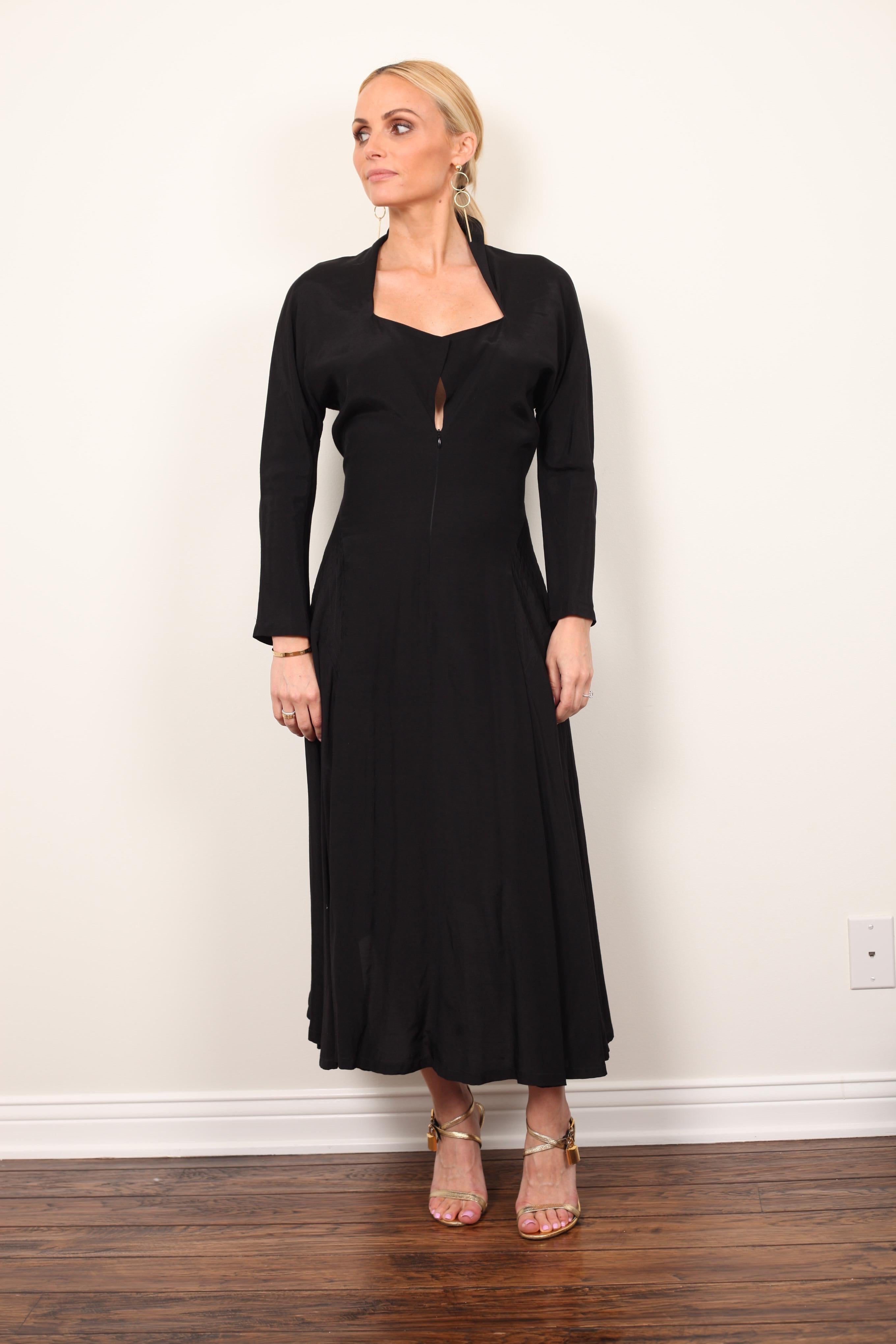 Pristine Yohji Yamamoto Black Dress with two different wearing / styling options. 
Tags still attached, 100% Rayon and zipper detail for the chest to wear two different ways. 
Ankle length and skirt is flowy. 