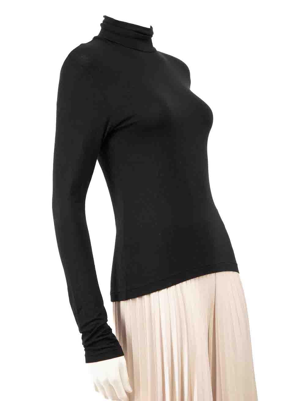 CONDITION is Very good. Hardly any visible wear to turtleneck is evident on this used Yohji Yamamoto designer resale item.
 
 
 
 Details
 
 
 Black
 
 Rayon
 
 Top
 
 Long sleeves
 
 Mock neck
 
 Back zip fastening
 
 Stretchy
 
 
 
 
 
 Made in