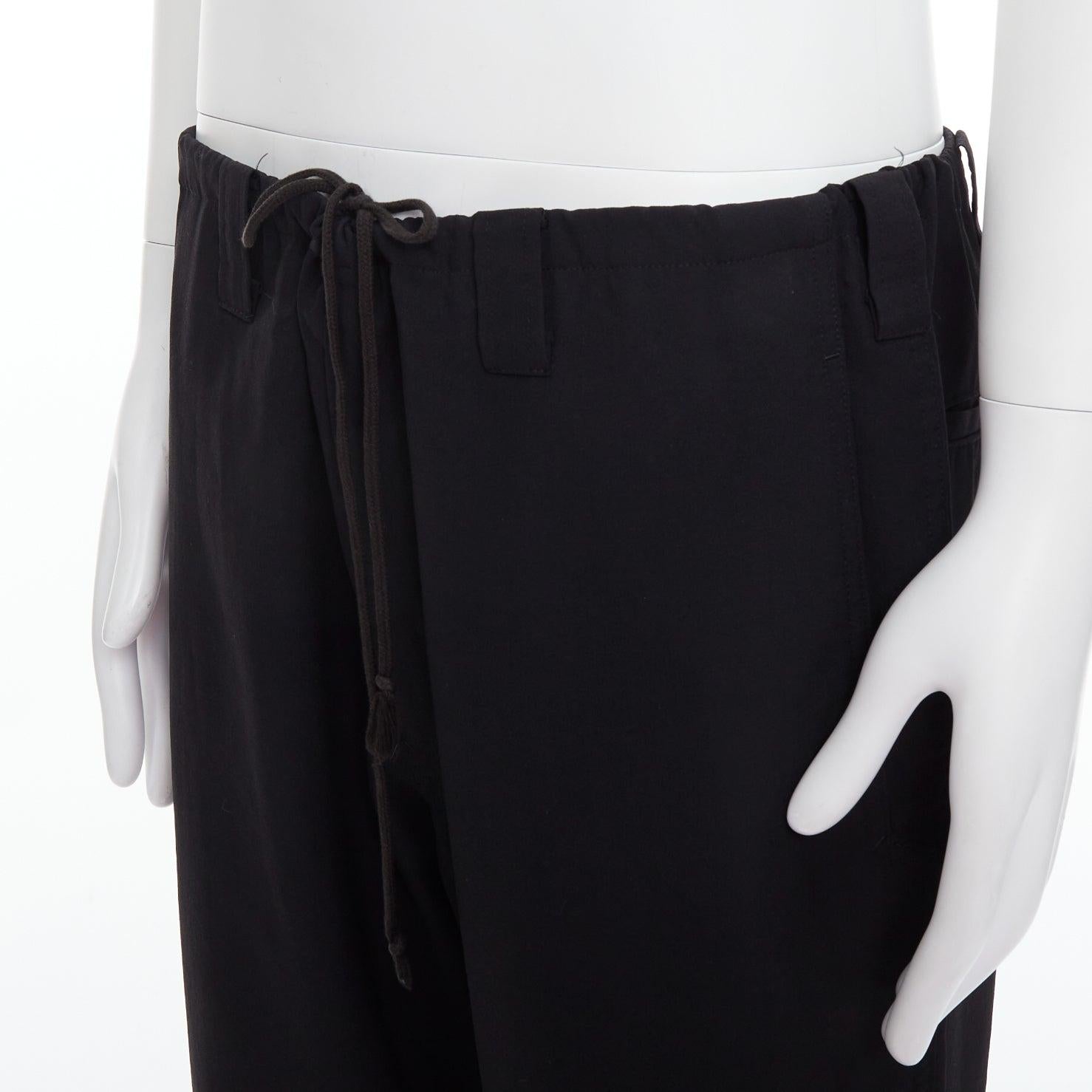 YOHJI YAMAMOTO pantalones anchos con dobladillo envejecido y cordón invisible negro JP4 XL en venta 2