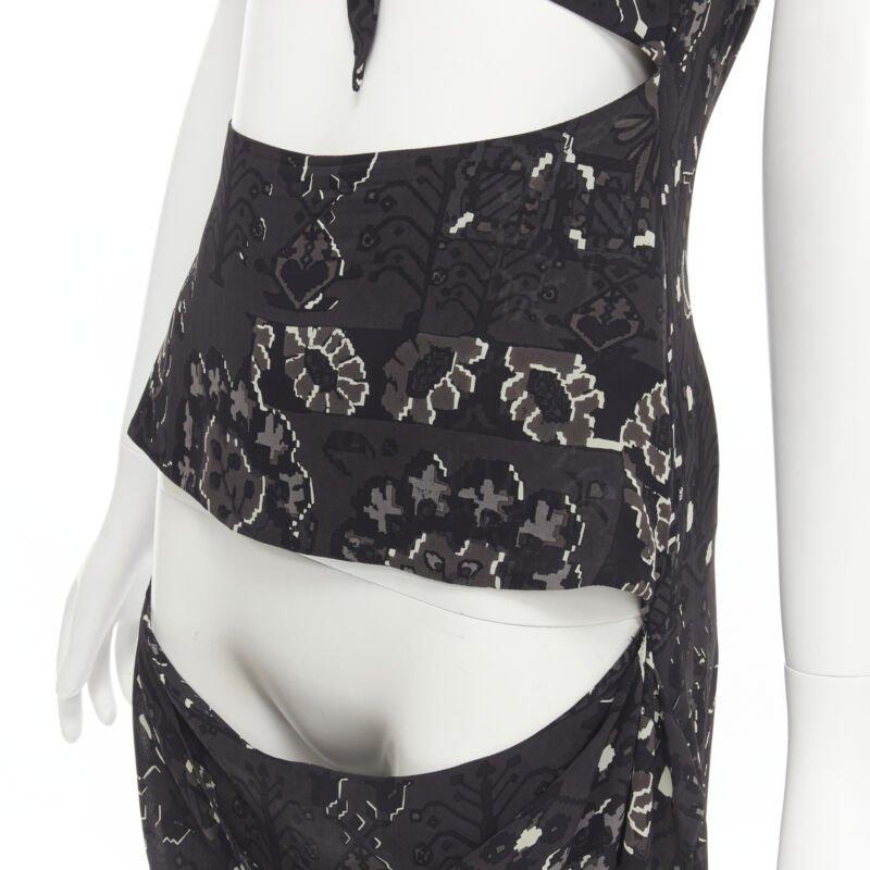 YOHJI YAMAMOTO black pixelated floral paisley cut out draped front midi dress S
Reference: CRTI/A00500
Brand: Yohji Yamamoto
Designer: Yohji Yamamoto
Material: Rayon
Color: Black
Pattern: Floral
Closure: Zip
Extra Details: Knot tie bust. Cut out at