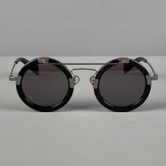 YOHJI YAMAMOTO Runde Sonnenbrille aus schwarzem und silbernem Acetat
