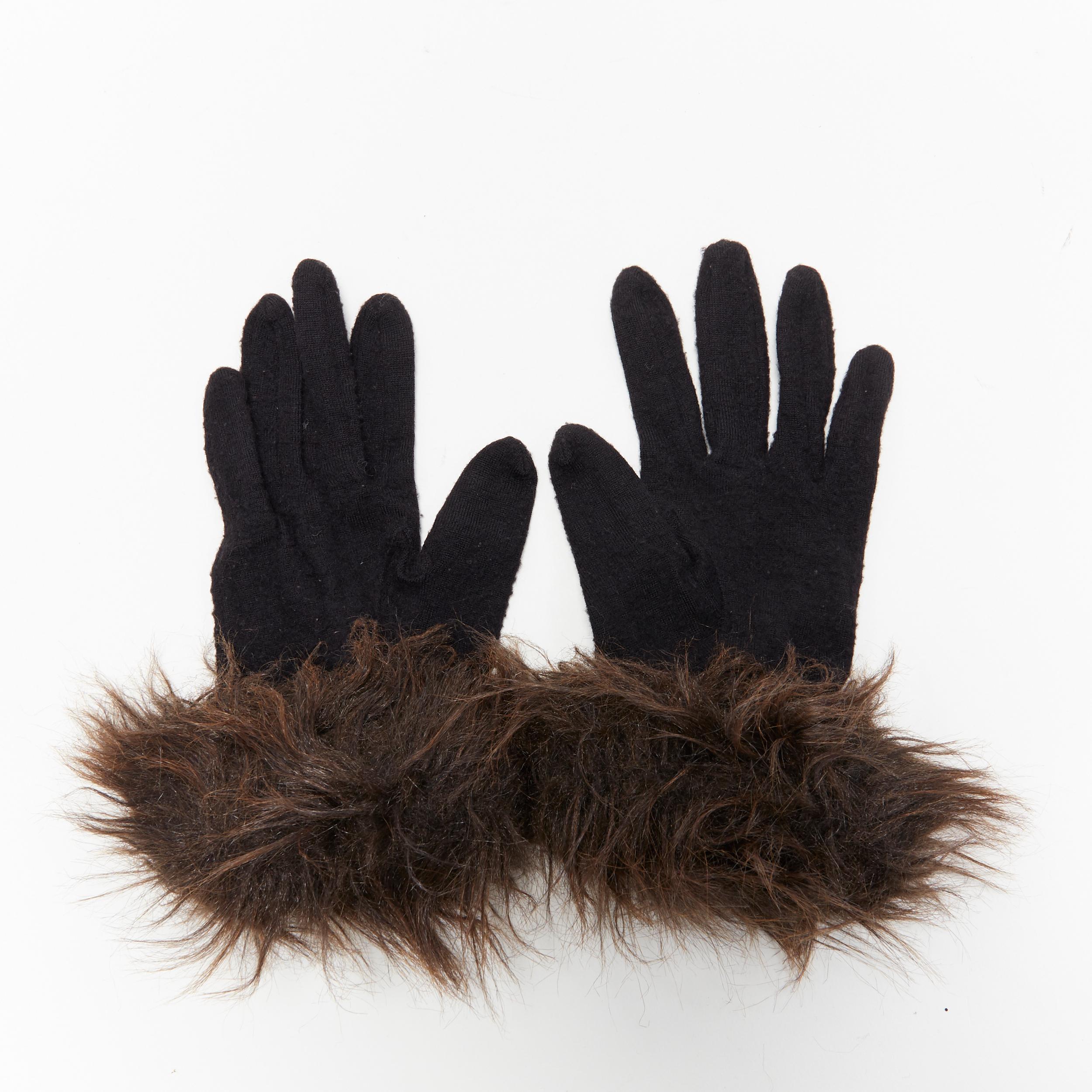 YOHJI YAMAMOTO black washed wool brown faux fur trimmed winter gloves
Brand: Yohji Yamamoto
Designer: v
Model Name / Style: Faux fur gloves
Material: Wool
Color: Black, brown
Pattern: Solid
Extra Detail: Faux fur trimming.
Made in: Japan

CONDITION: