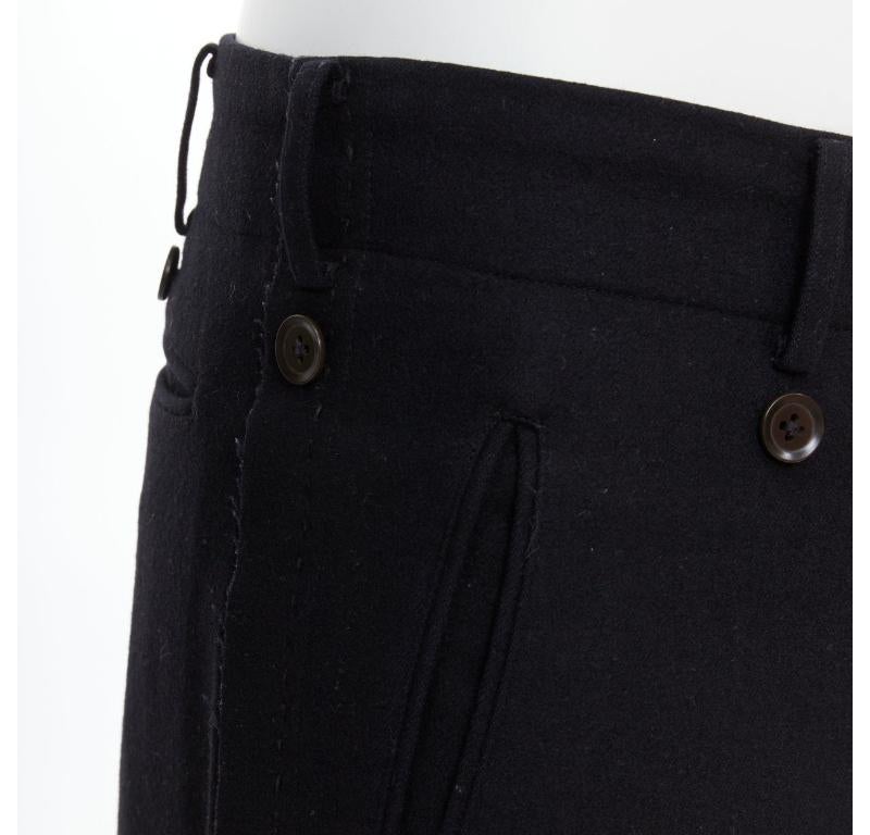 YOHJI YAMAMOTO Pantalones con bordes en crudo adornados con botones en mezcla de lana negra JP2 M
Referencia: PRCG/A00058
Marca: Yohji Yamamoto
Material: Lana, mezcla
Color: Negro
Patrón: Sólido
Cierre: Botón
Detalles adicionales: Costuras con