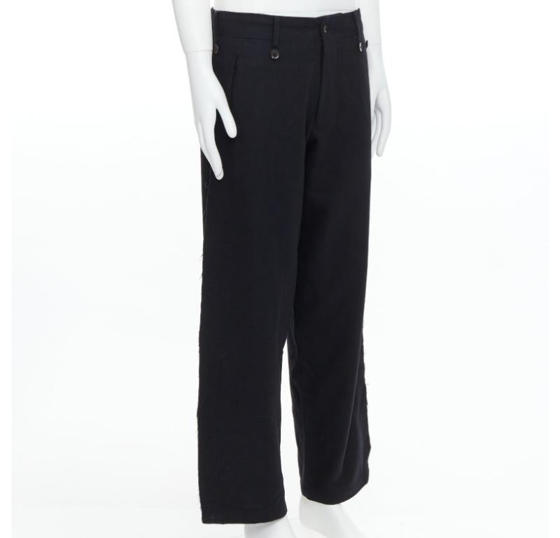 YOHJI YAMAMOTO Pantalones con bordes en crudo adornados con botones en mezcla de lana negra JP2 M Negro en venta