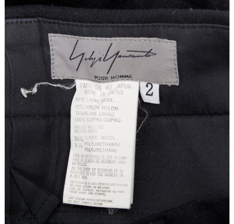 YOHJI YAMAMOTO Pantalones con bordes en crudo adornados con botones en mezcla de lana negra JP2 M en venta 3